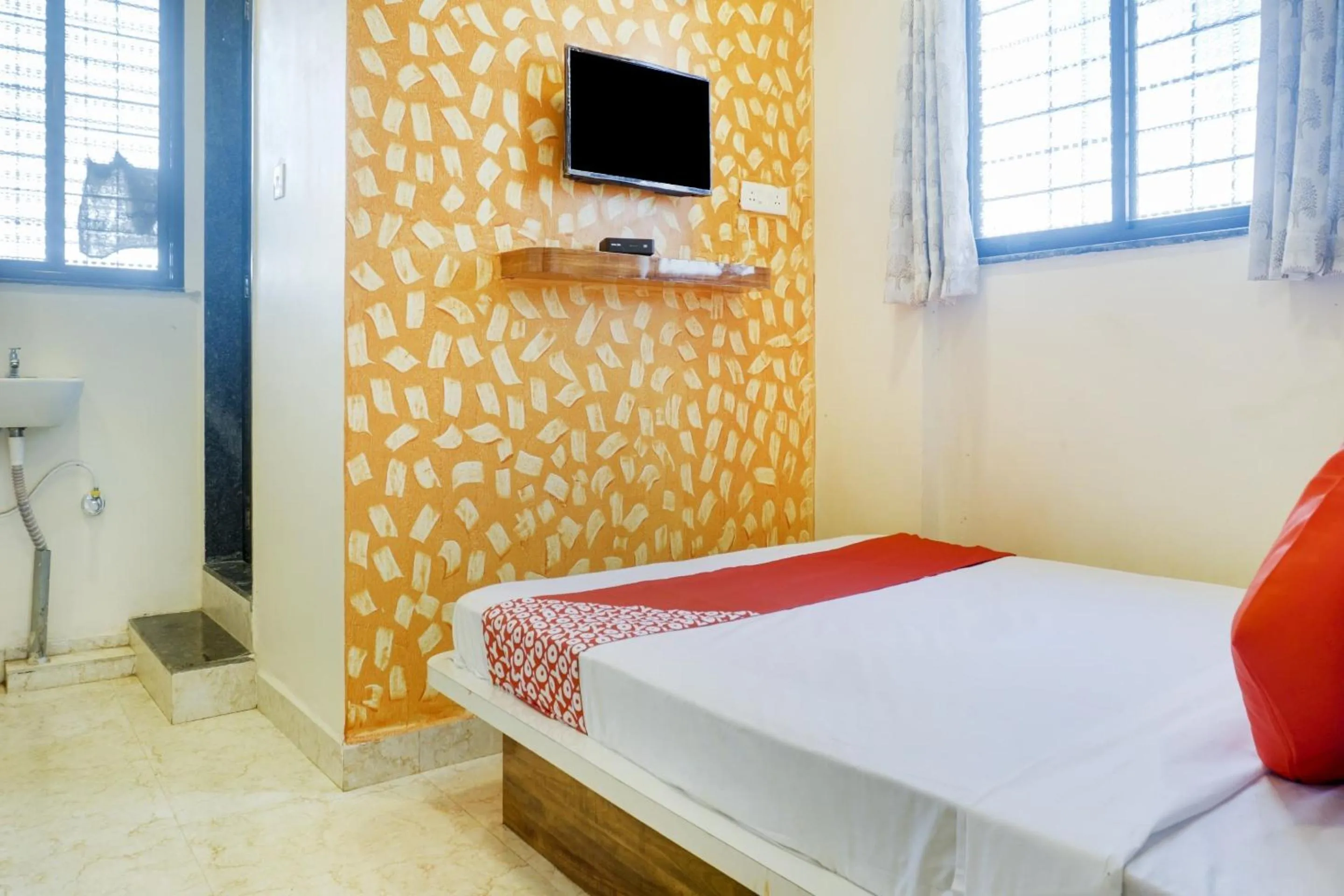 Bedroom in Hotel O Vijay Residency
