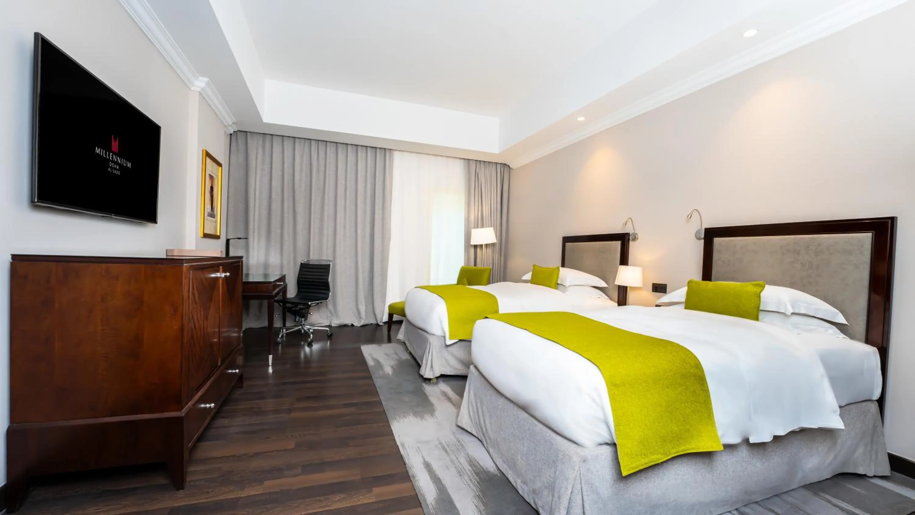 Photo of the whole room, Bed in Millennium Hotel Doha