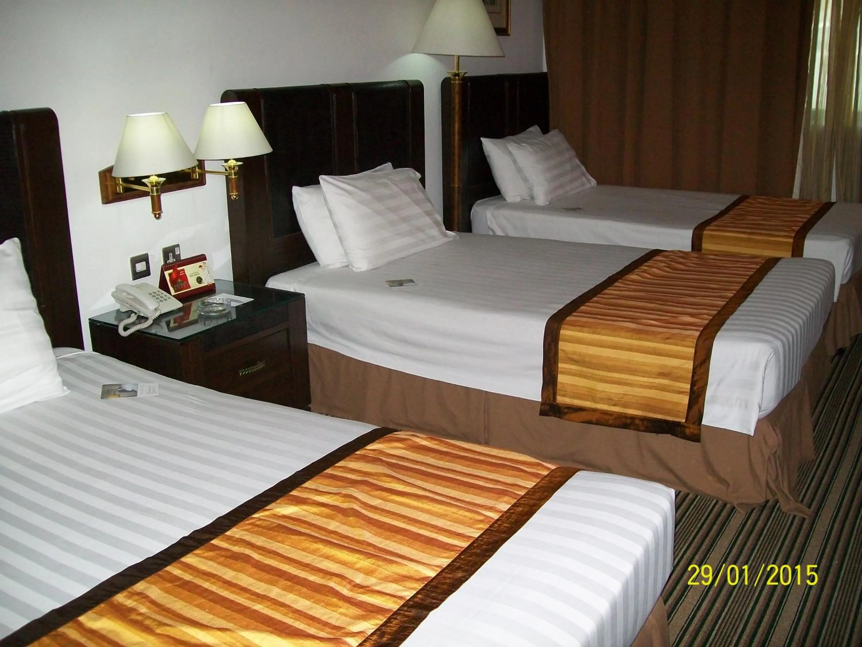 Bed in Grand Mayfair Hotel