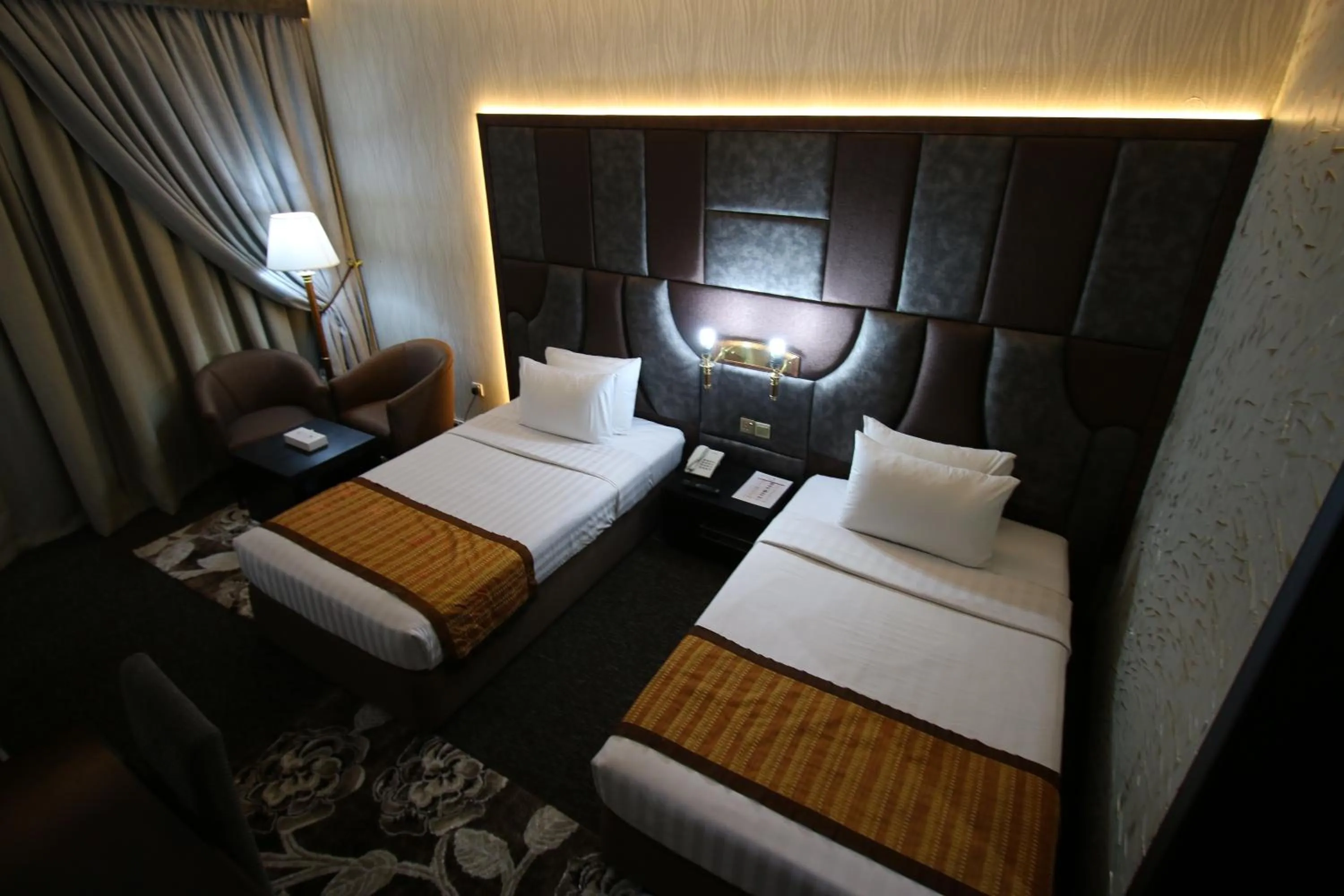 Bed in Grand Mayfair Hotel