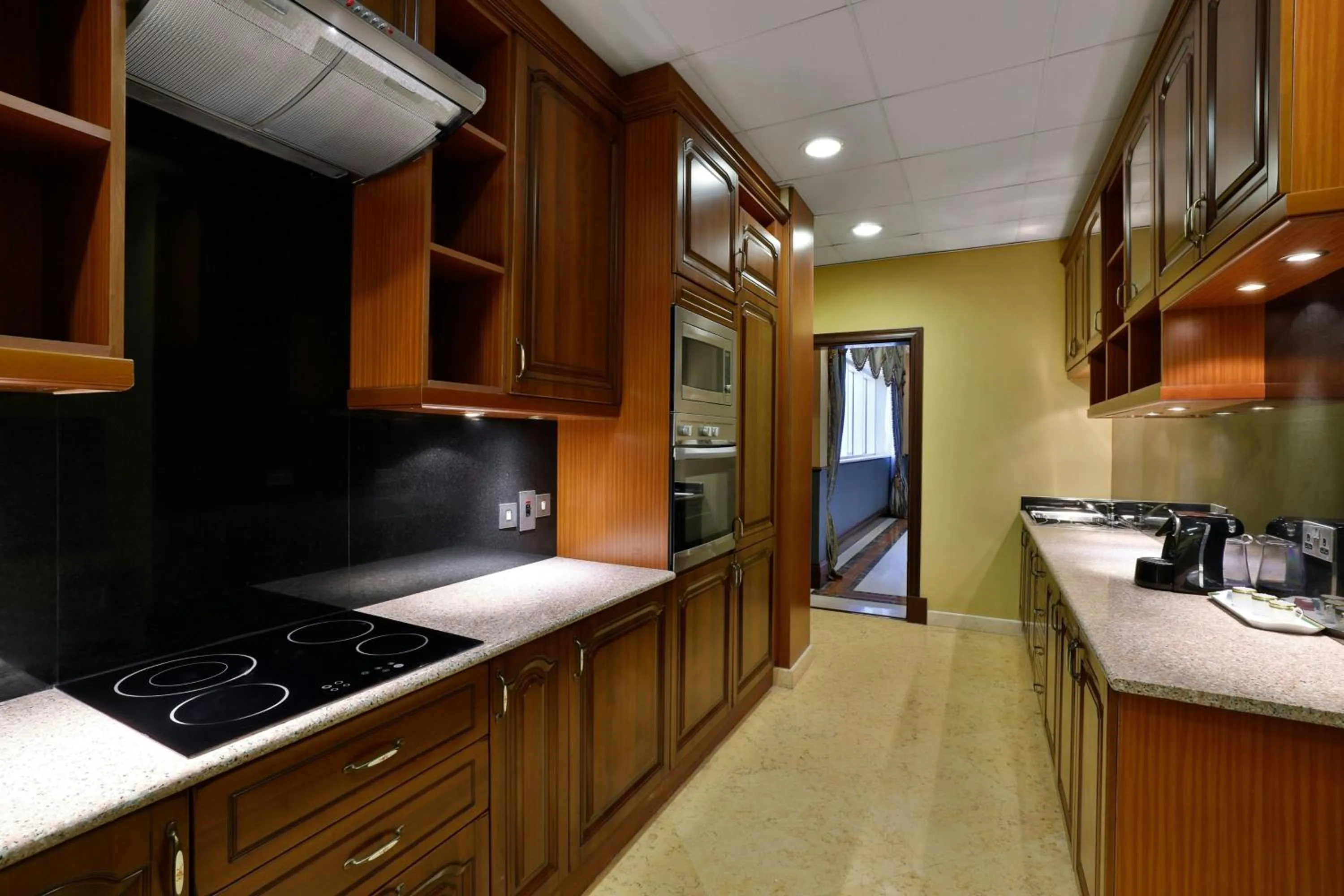 Kitchen or kitchenette in Al Habtoor Grand Resort, Autograph Collection