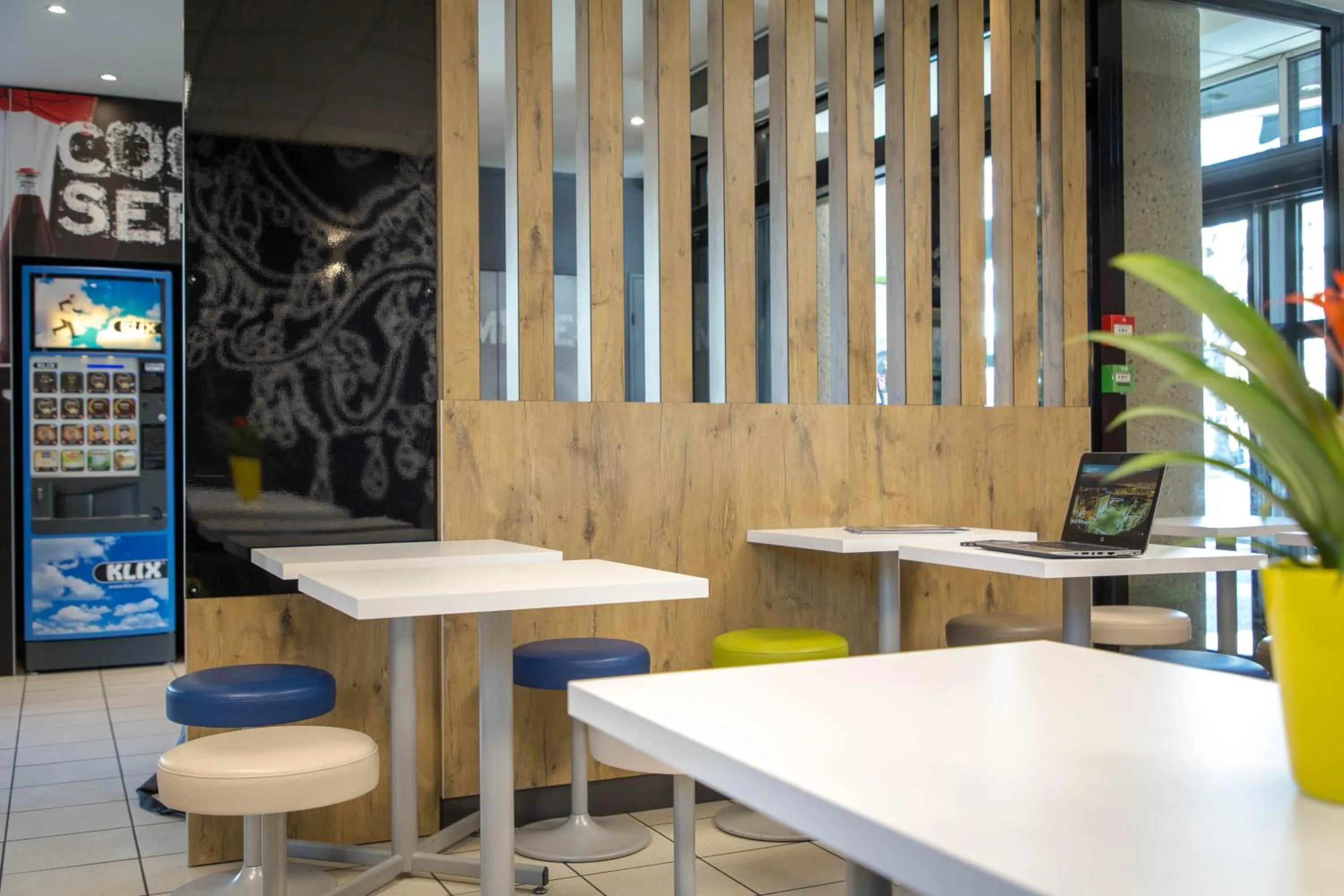 Communal lounge/ TV room in ibis budget Vienne Sud