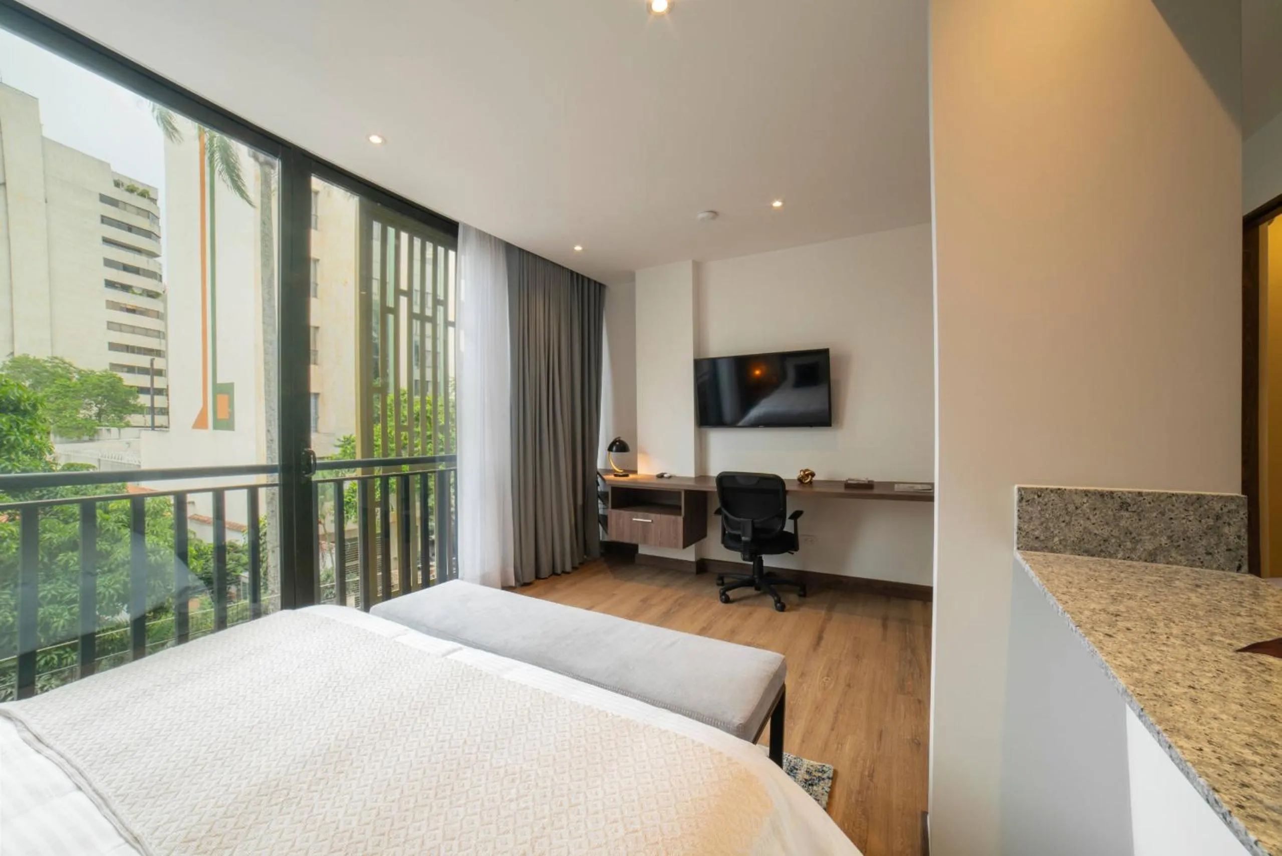 Bed in Cali River Suites by Yellowkey Capital