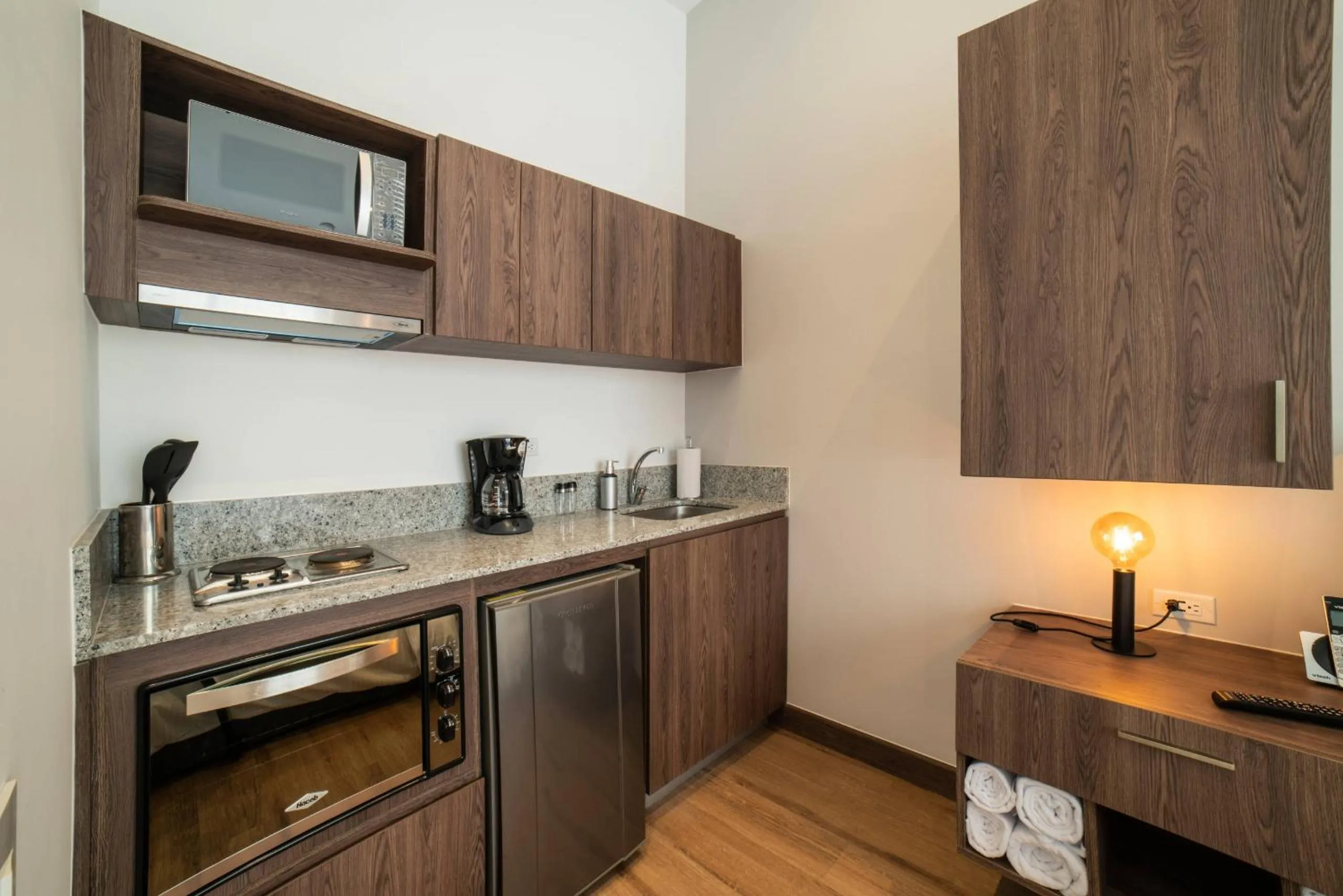 Kitchen or kitchenette in Cali River Suites by Yellowkey Capital
