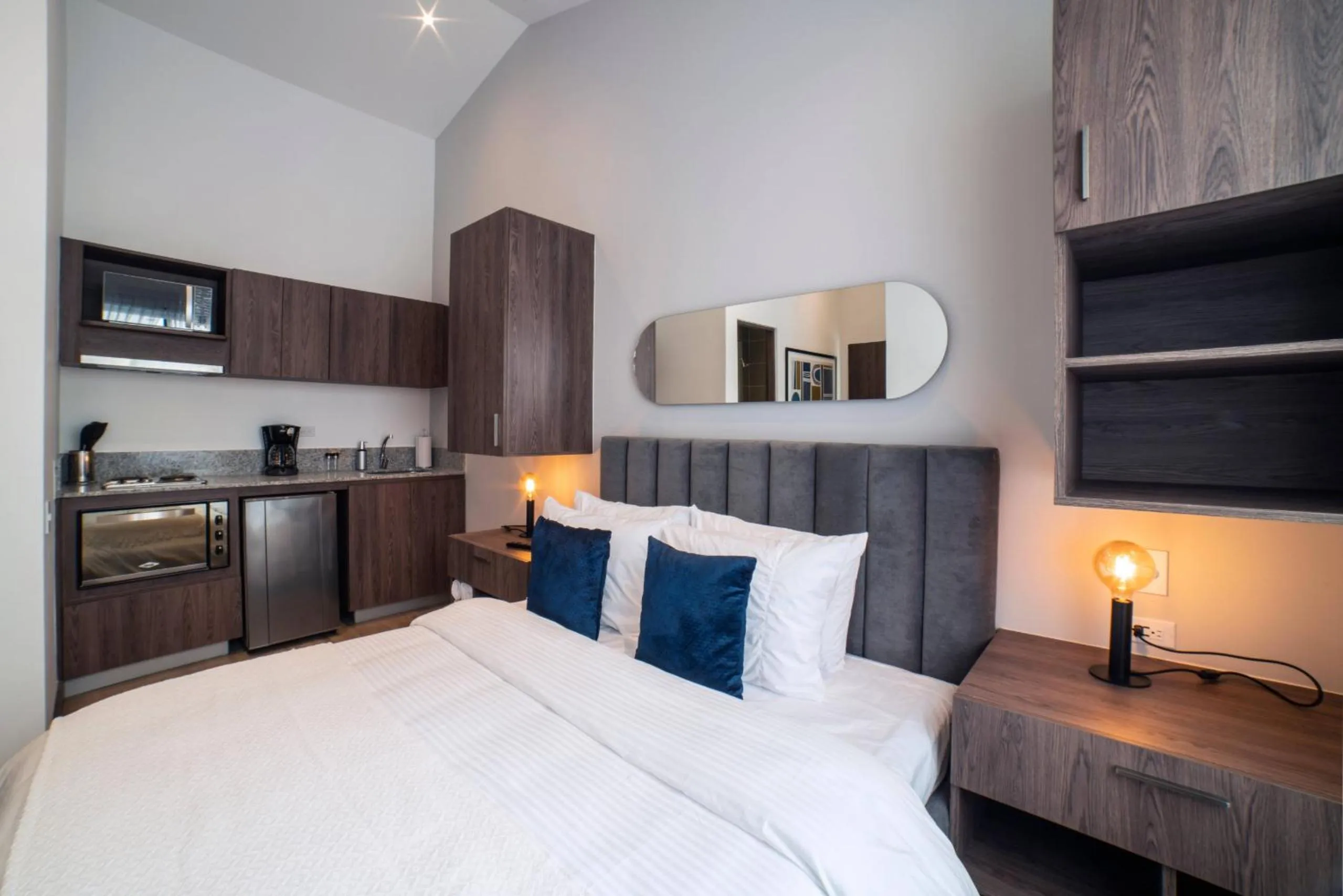 Bed in Cali River Suites by Yellowkey Capital