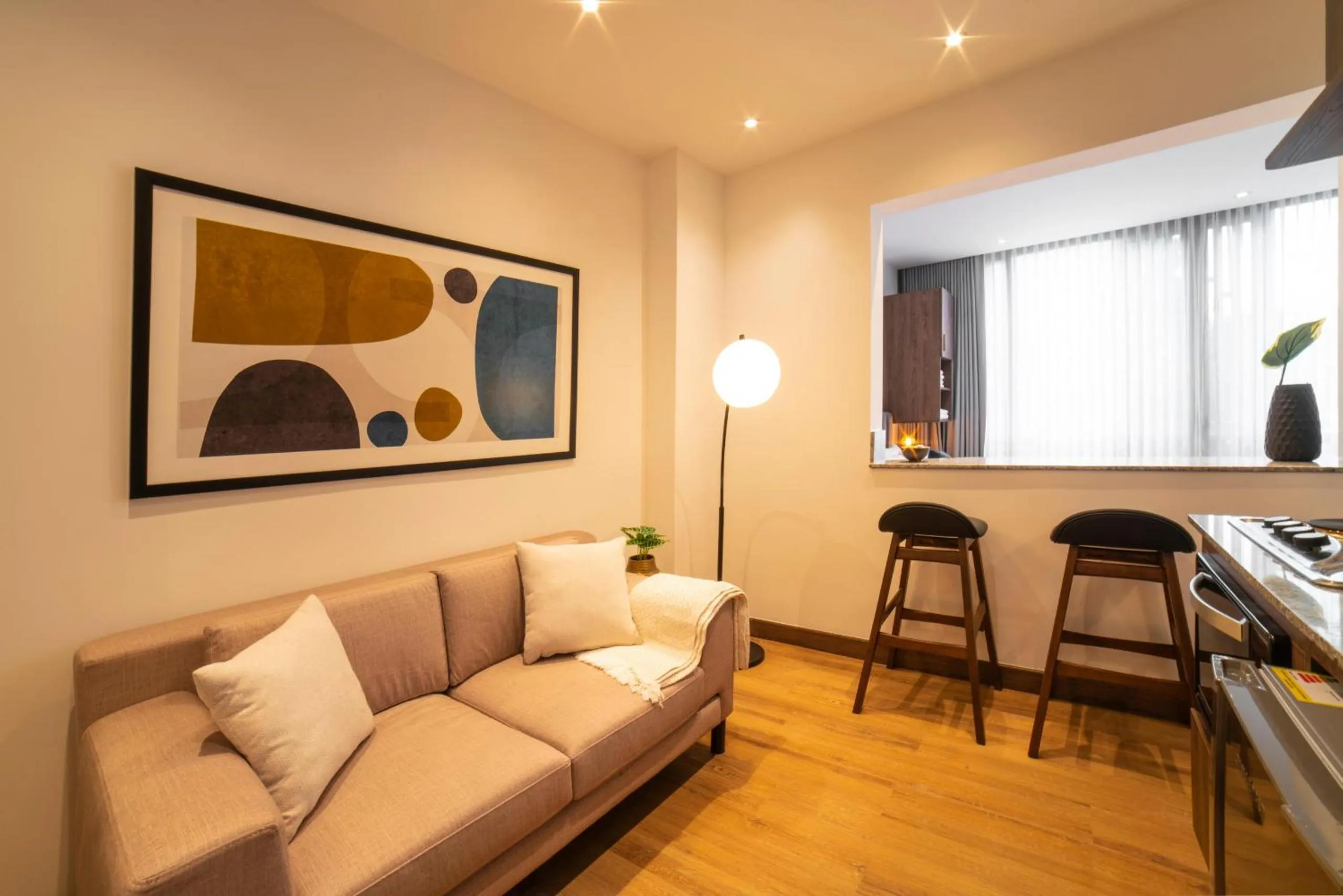 Communal lounge/ TV room in Cali River Suites by Yellowkey Capital