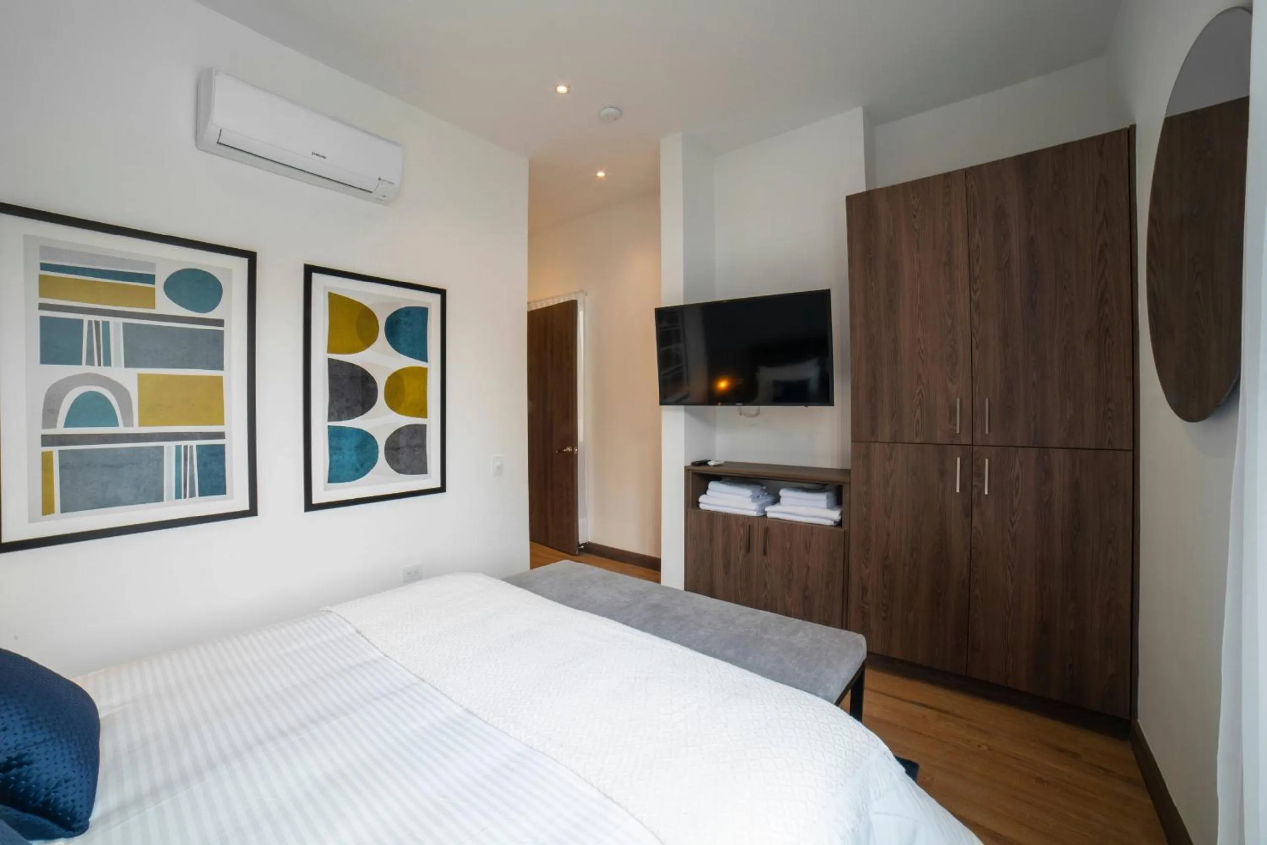 Bed in Cali River Suites by Yellowkey Capital