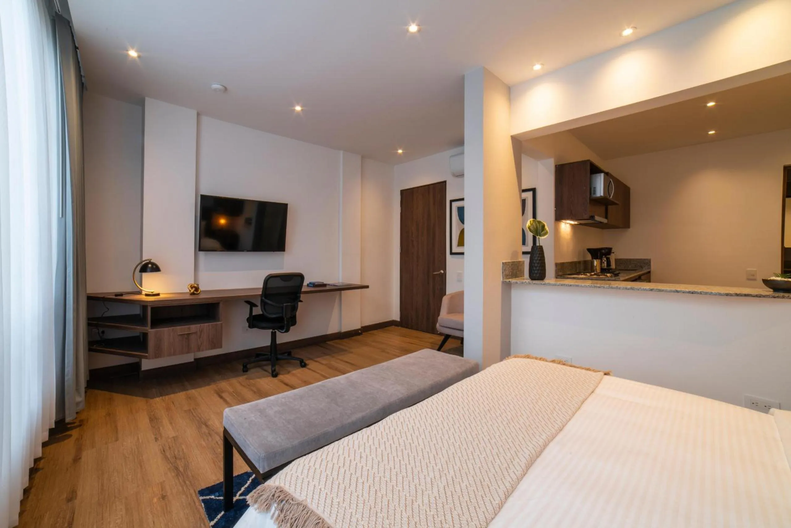 Bed in Cali River Suites by Yellowkey Capital