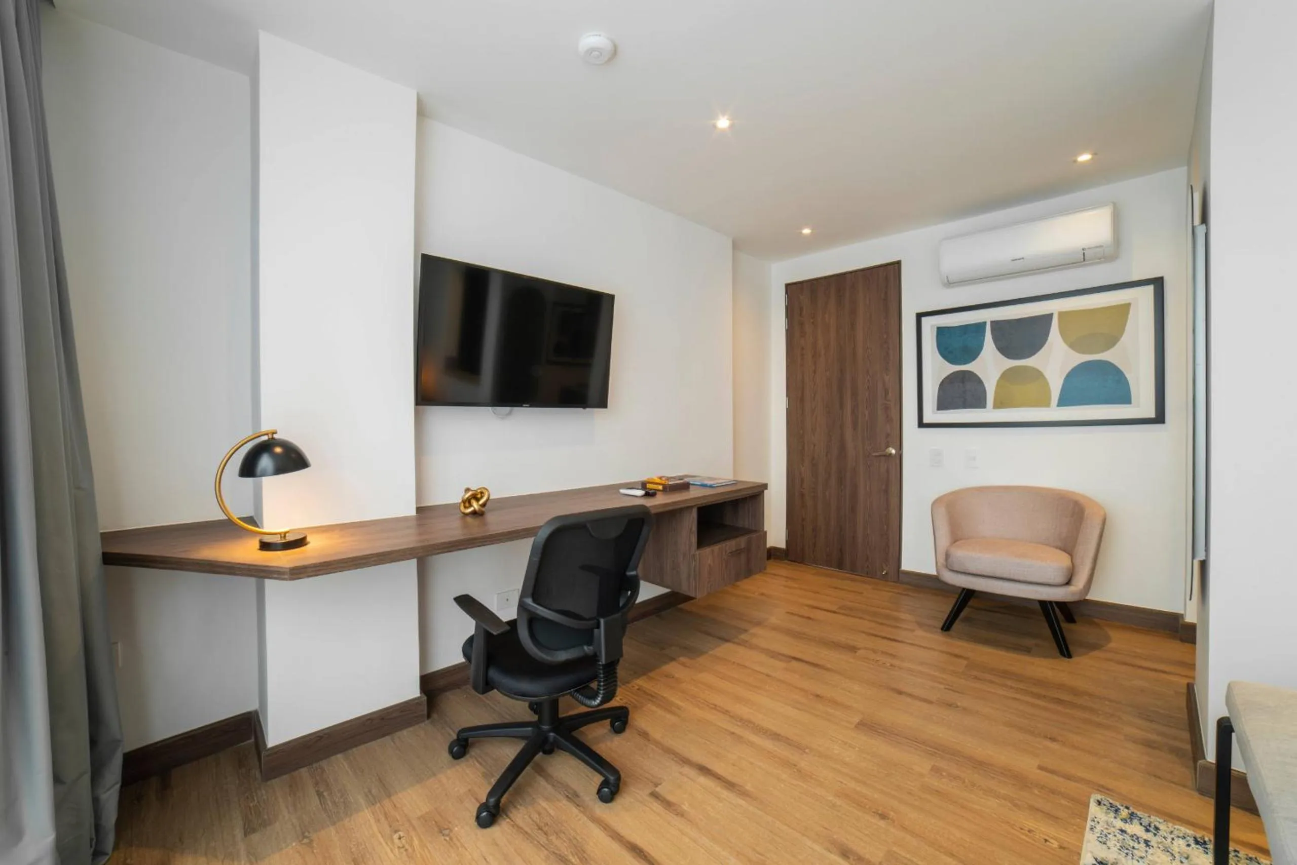 Bed in Cali River Suites by Yellowkey Capital