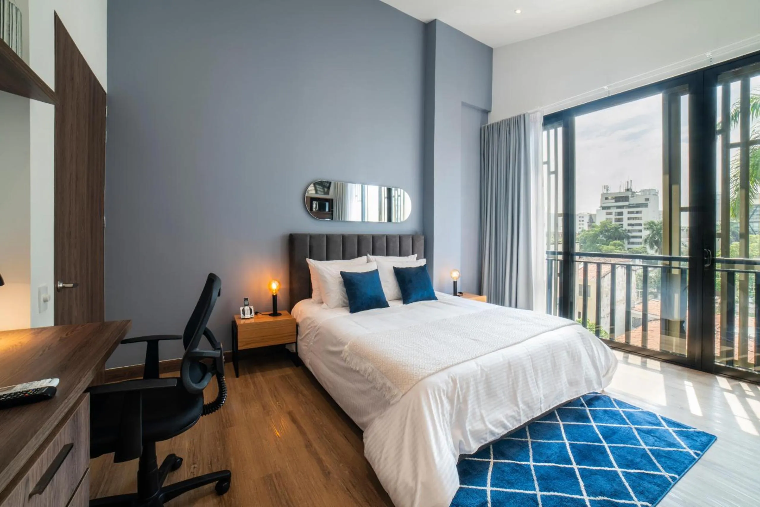 Bed in Cali River Suites by Yellowkey Capital