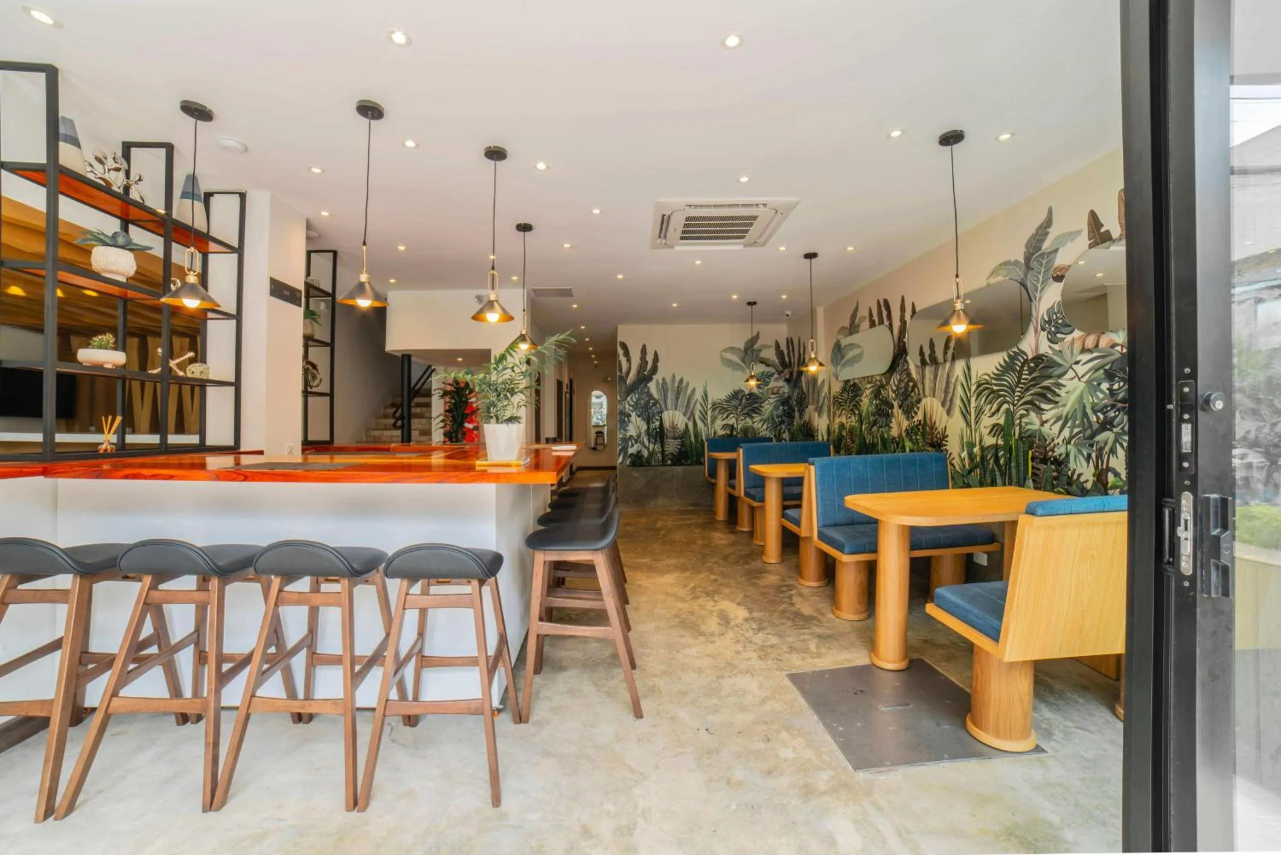 Dining area in Cali River Suites by Yellowkey Capital