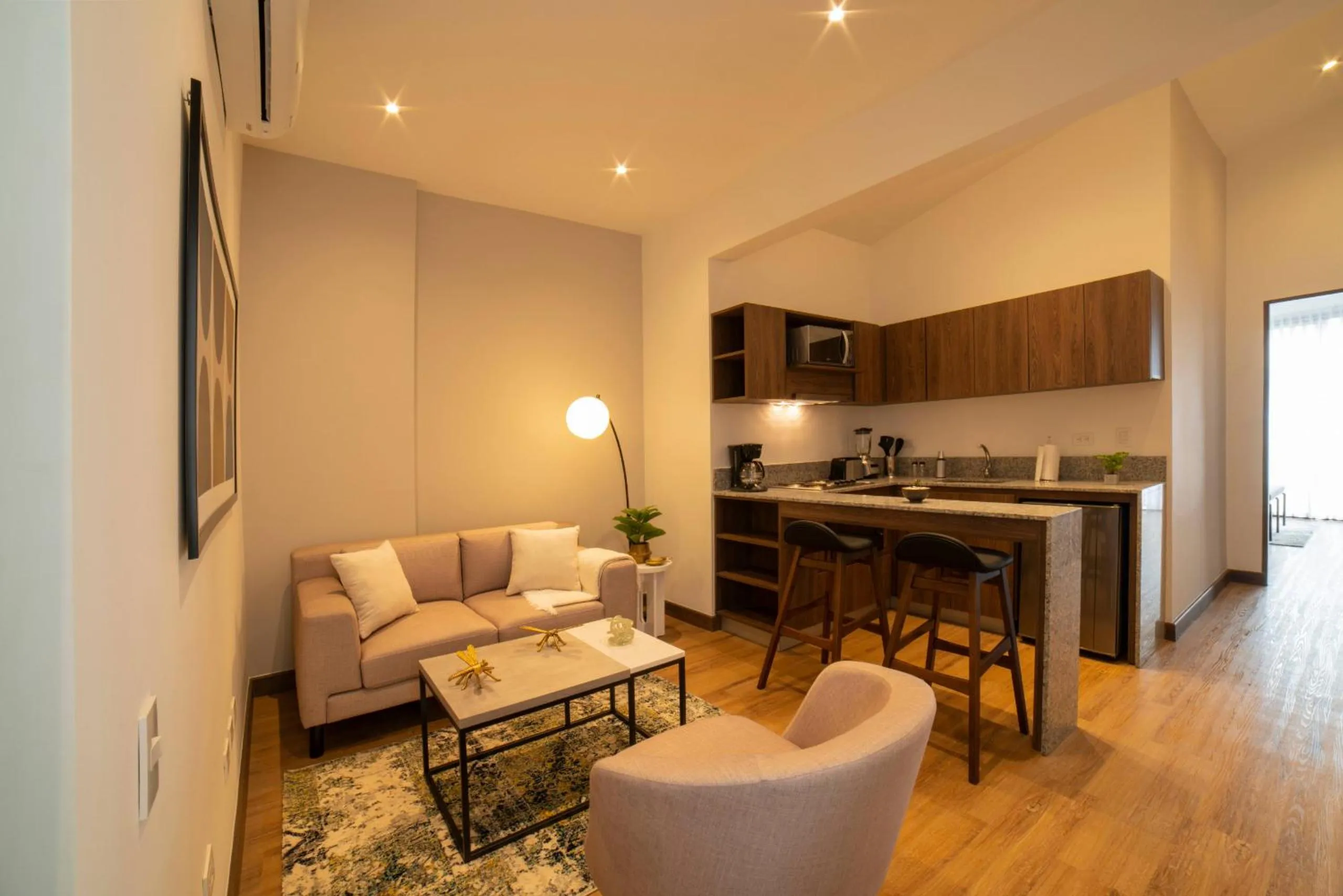 Communal lounge/ TV room in Cali River Suites by Yellowkey Capital