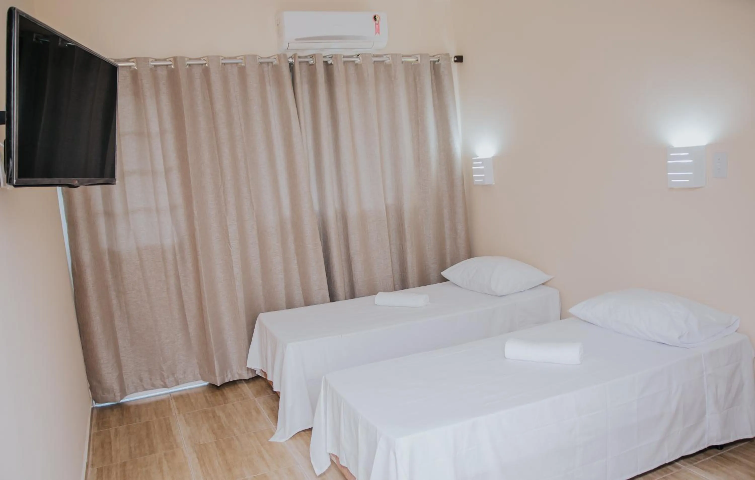 Bed in Pousada La Brisa