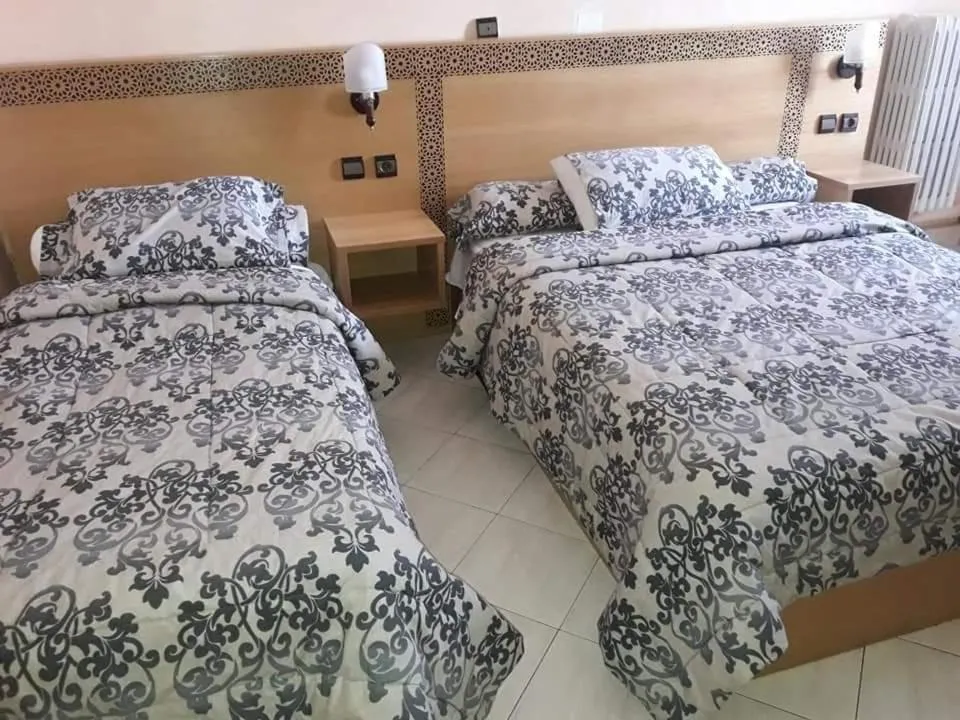 Bed in HOTEL VELLEDA