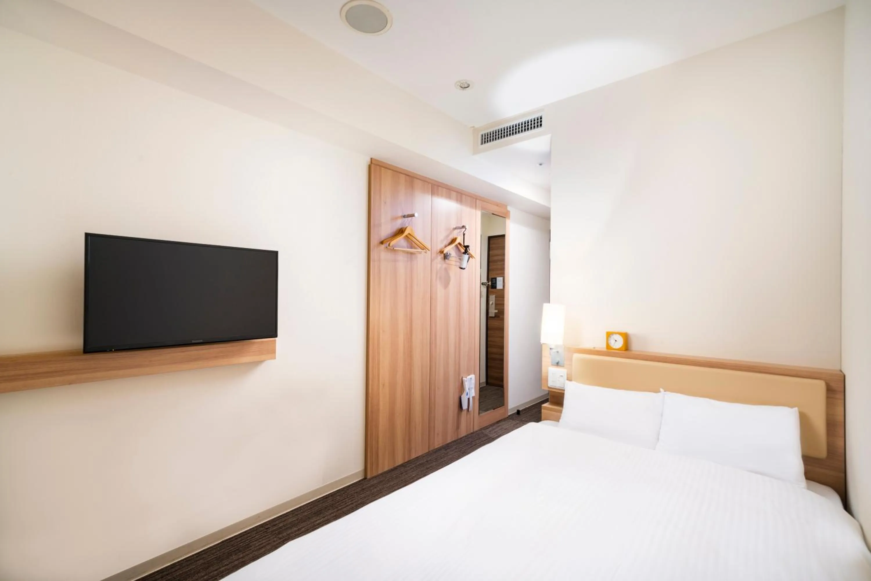 Photo of the whole room, Bed in KOKO HOTEL Sapporo Ekimae