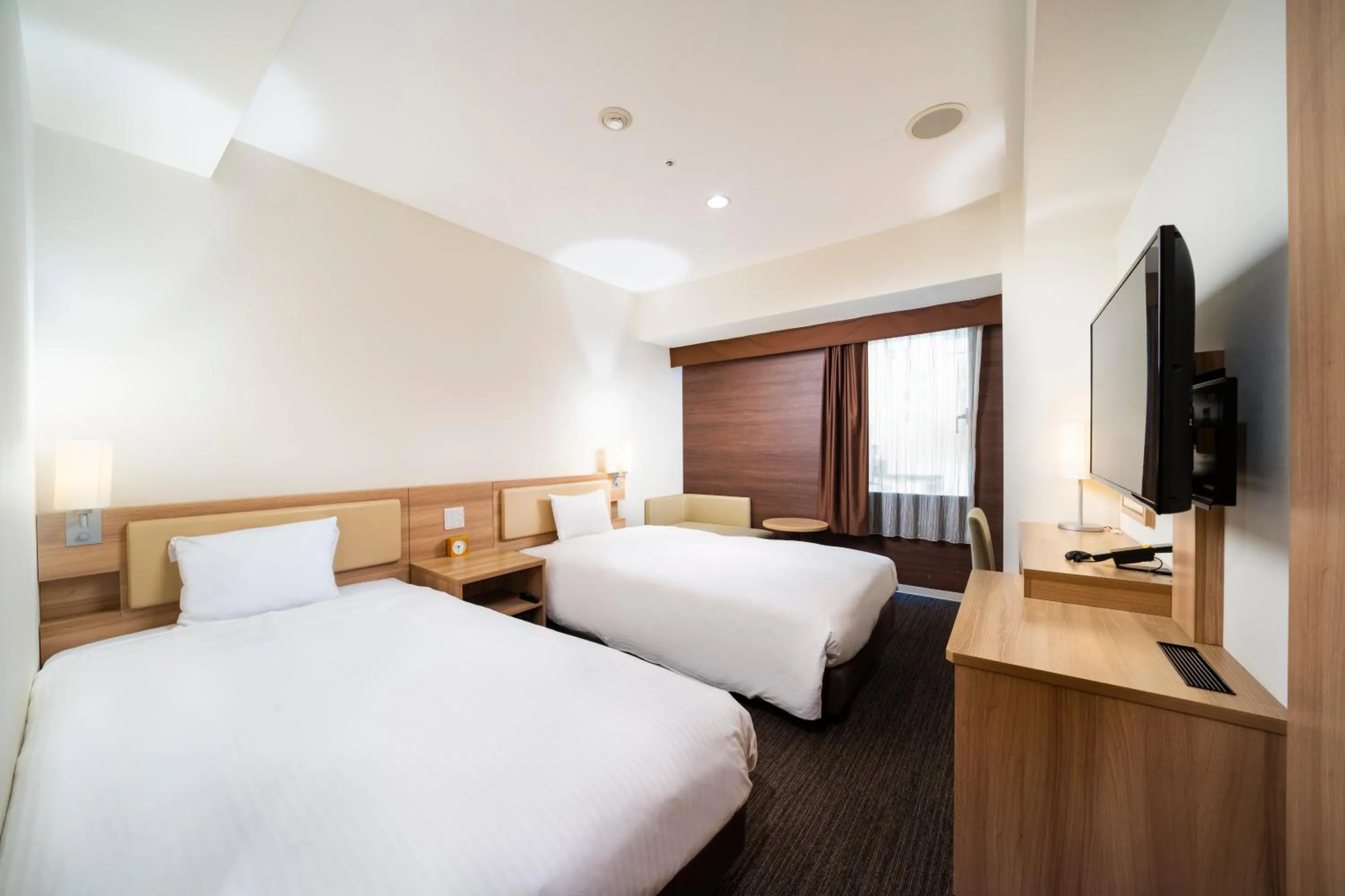 Photo of the whole room, Bed in KOKO HOTEL Sapporo Ekimae