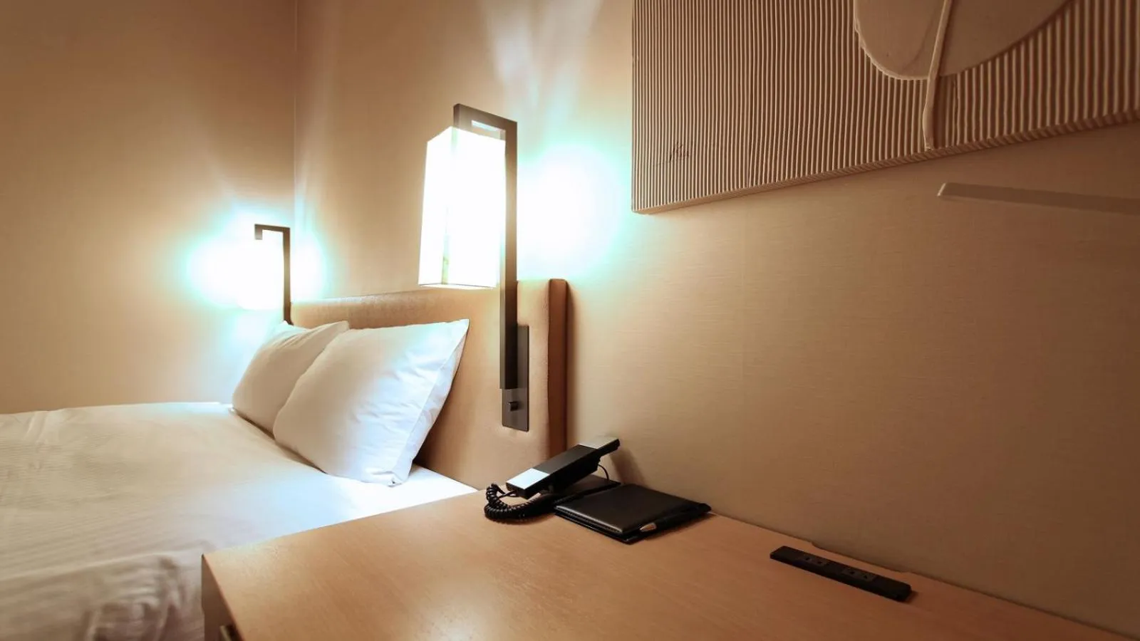 Bed in KOKO HOTEL Fukuoka Tenjin