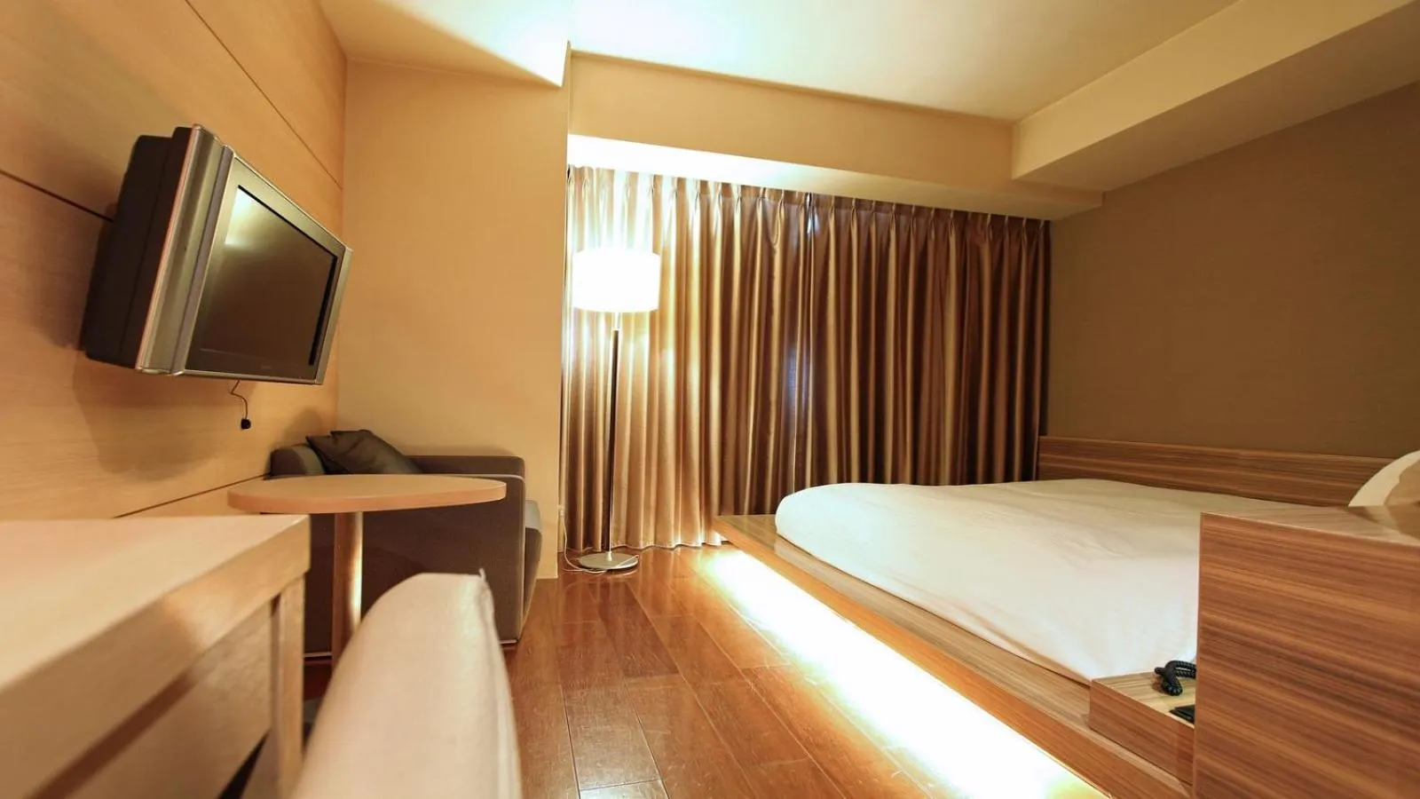 Bed in KOKO HOTEL Fukuoka Tenjin