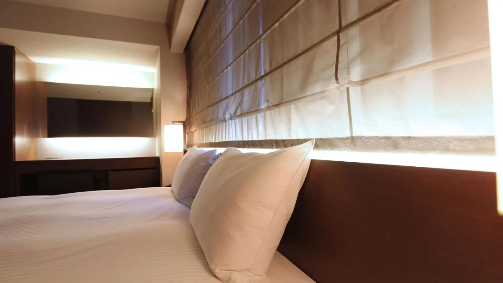 Bed in KOKO HOTEL Fukuoka Tenjin