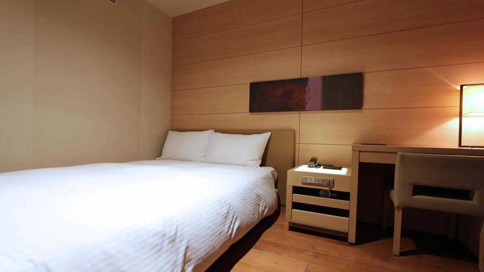 Bed in KOKO HOTEL Fukuoka Tenjin