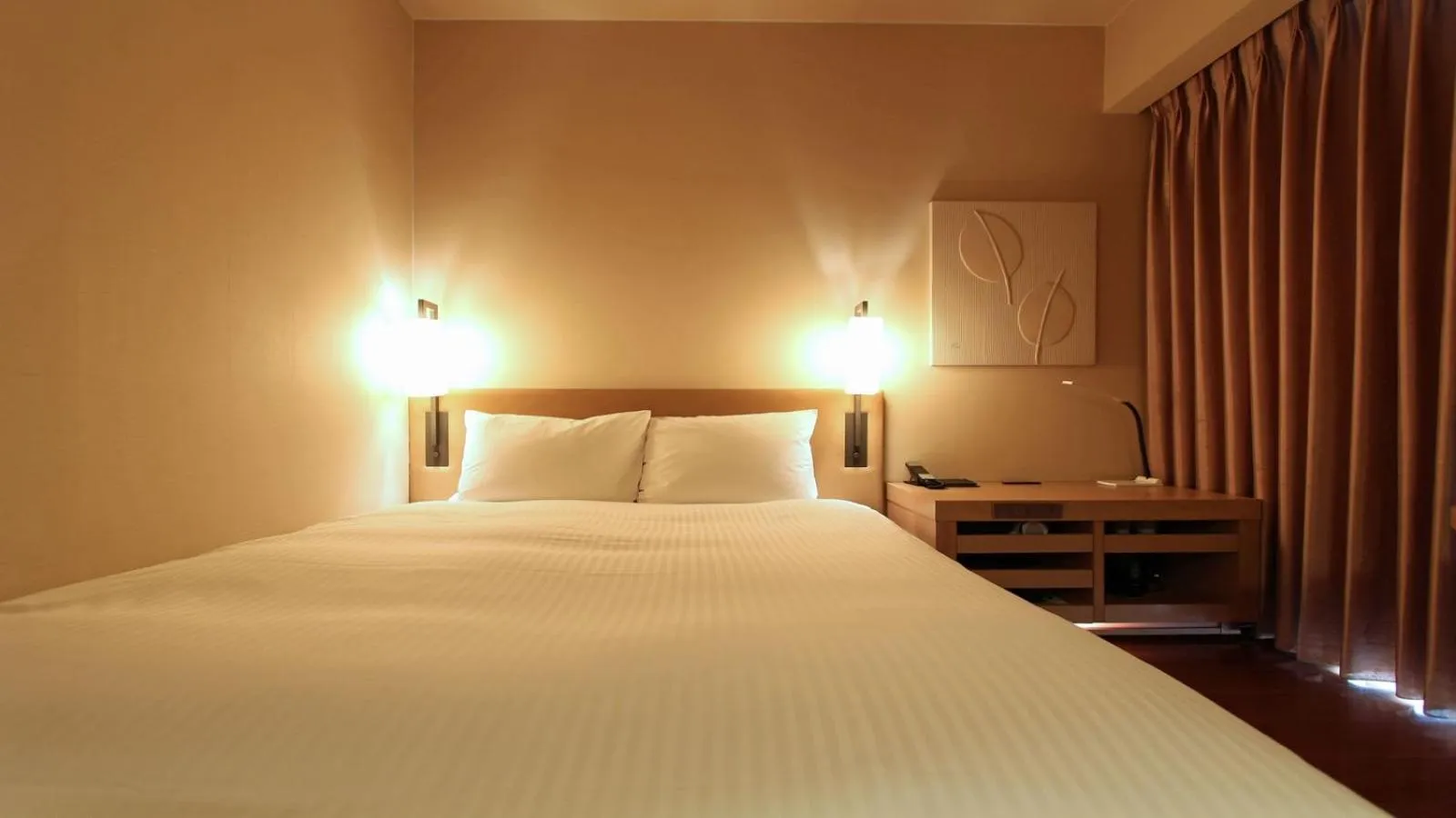 Bed in KOKO HOTEL Fukuoka Tenjin