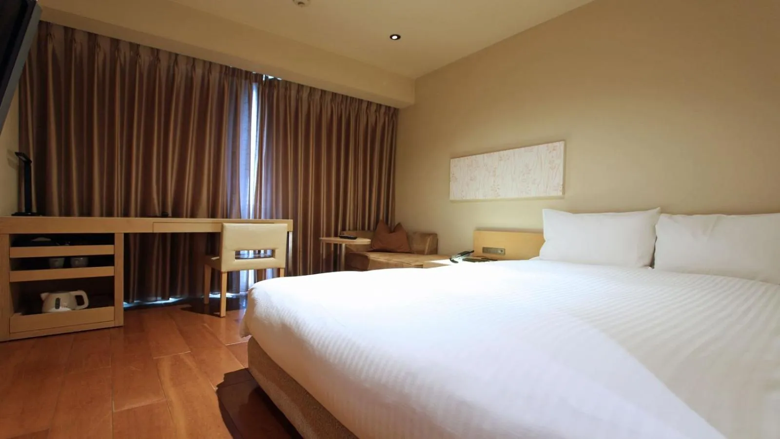 Bed in KOKO HOTEL Fukuoka Tenjin