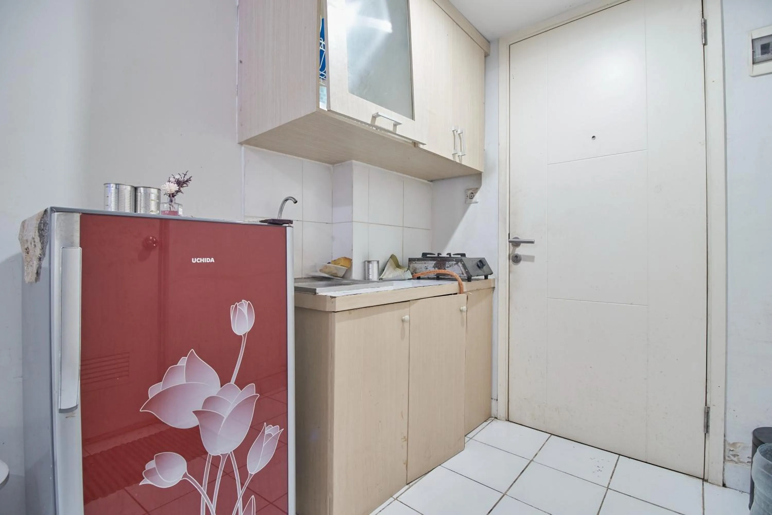 Kitchen or kitchenette in Room Rendi @ Apt Dramaga Tower