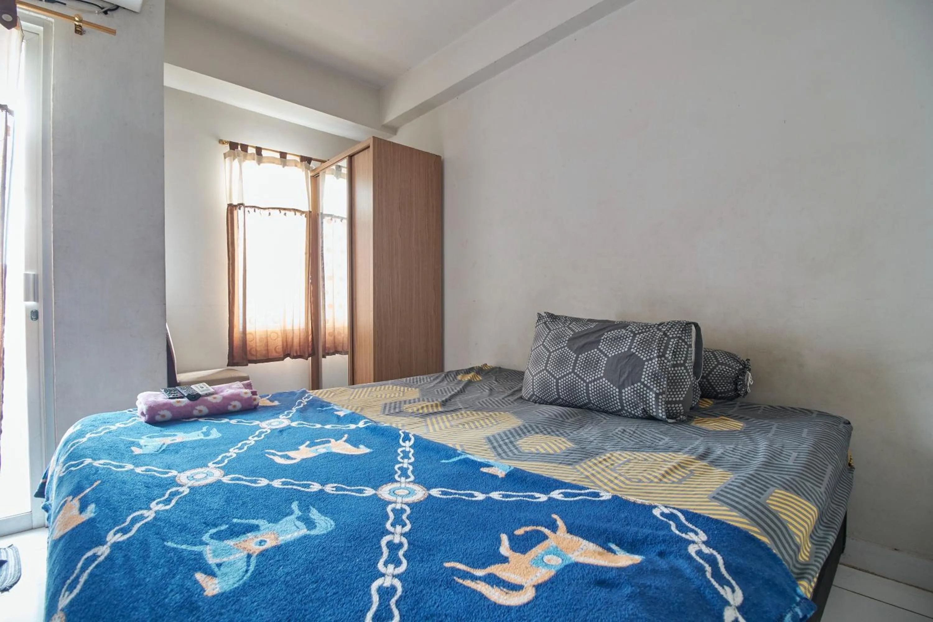 Bedroom, Bed in Room Rendi @ Apt Dramaga Tower