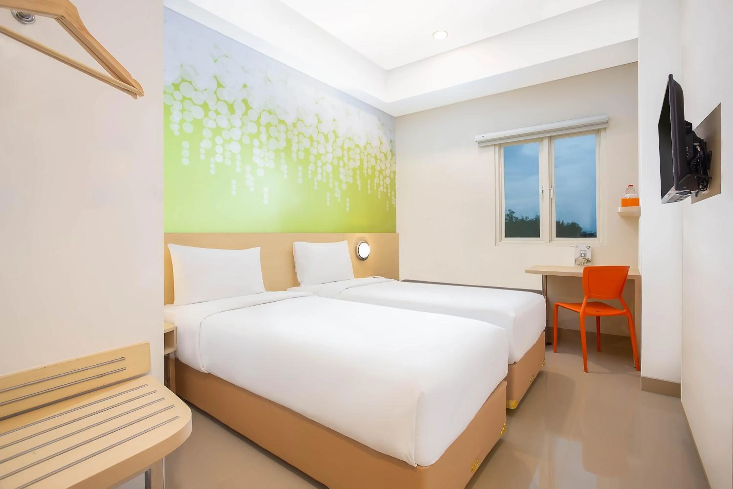 Bed in Zest Parang Raja Solo by Swiss-Belhotel International