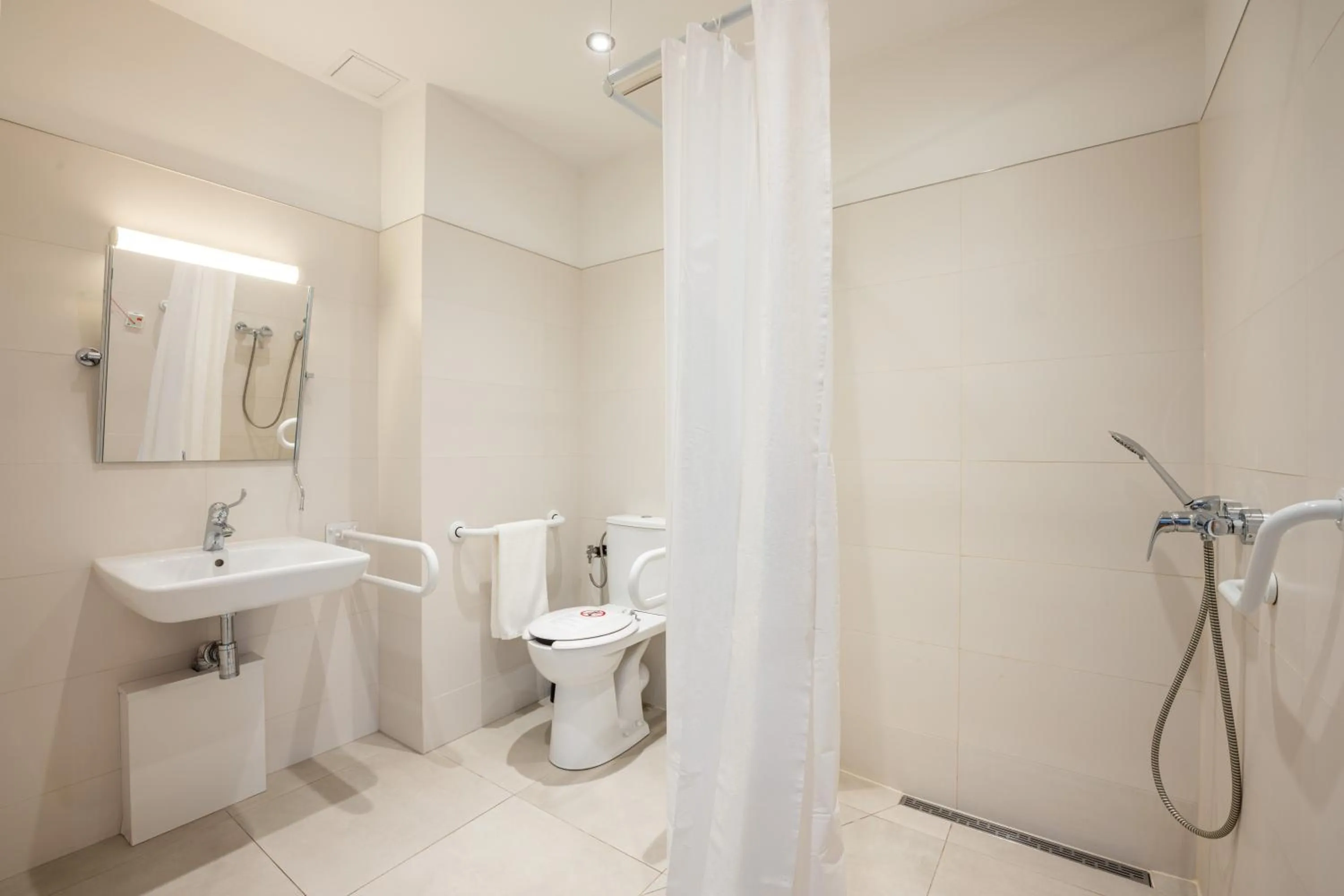 Bathroom in Aparthotel City Break Wolska