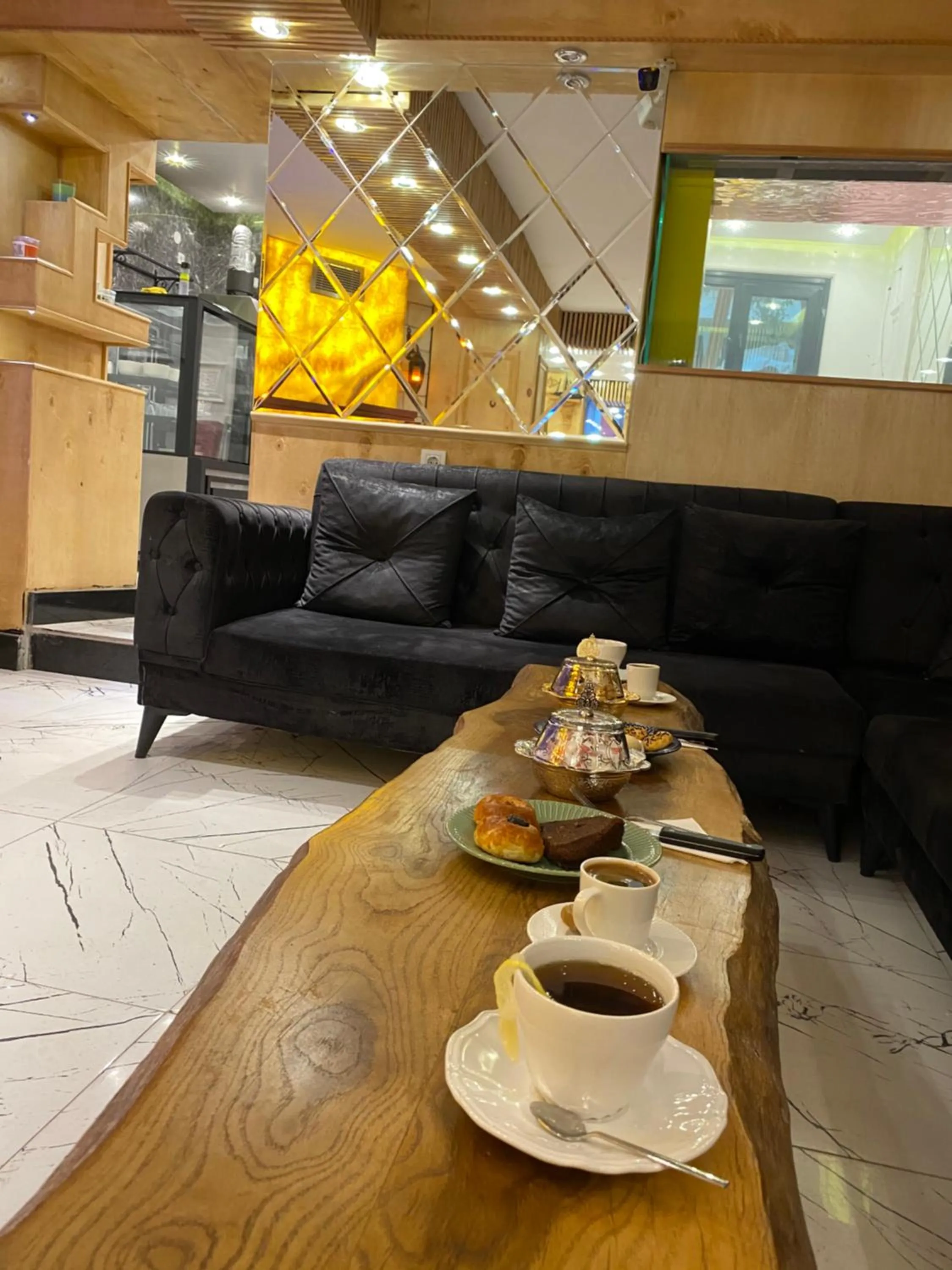 Lobby or reception in GANJ Hotel