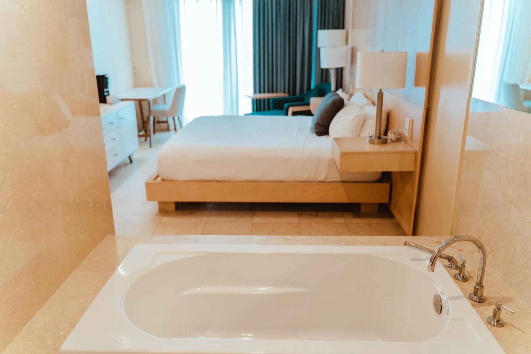 Bath, Bed in The Mill Resort and Suites