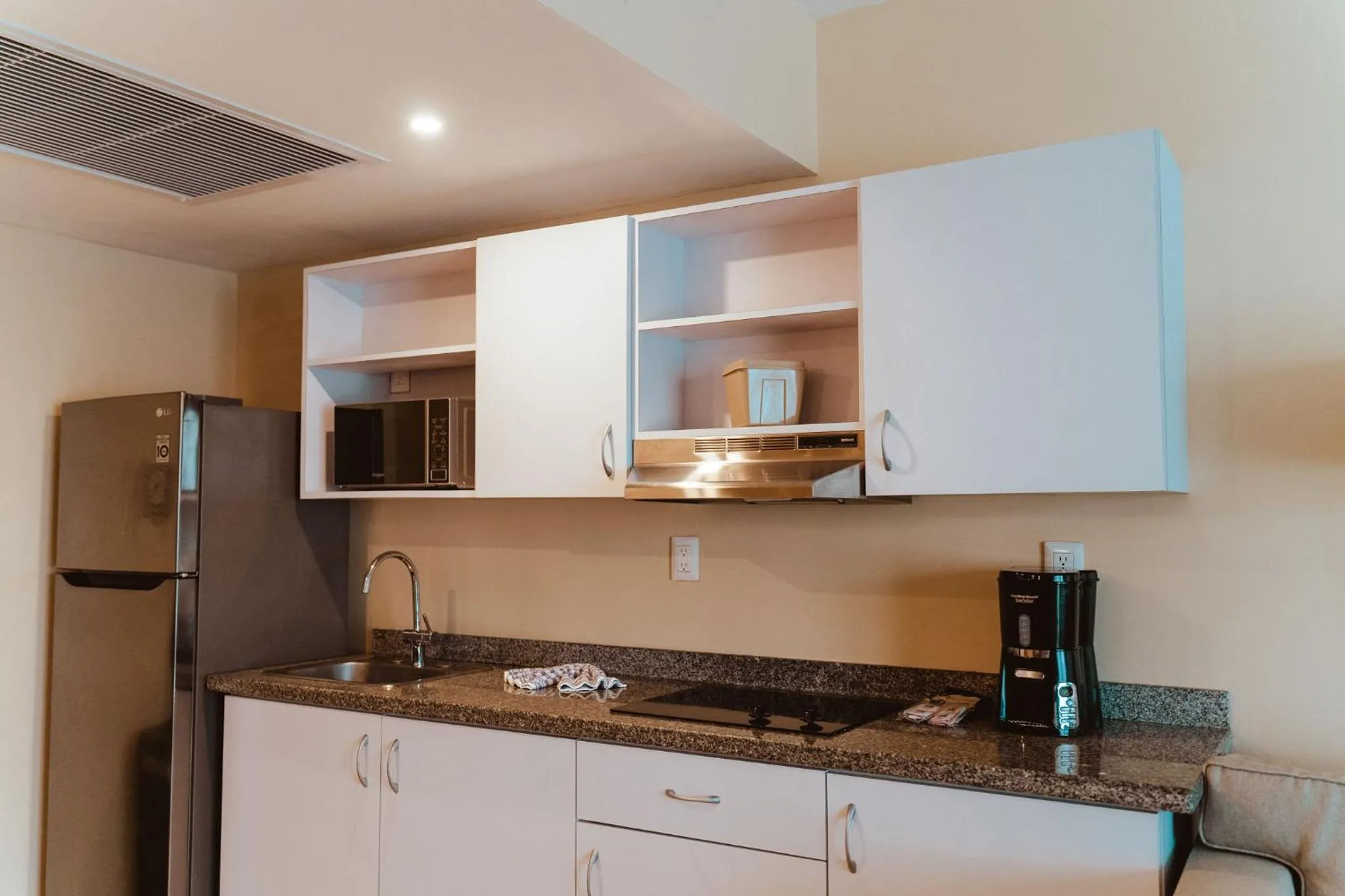 Kitchen or kitchenette in The Mill Resort and Suites