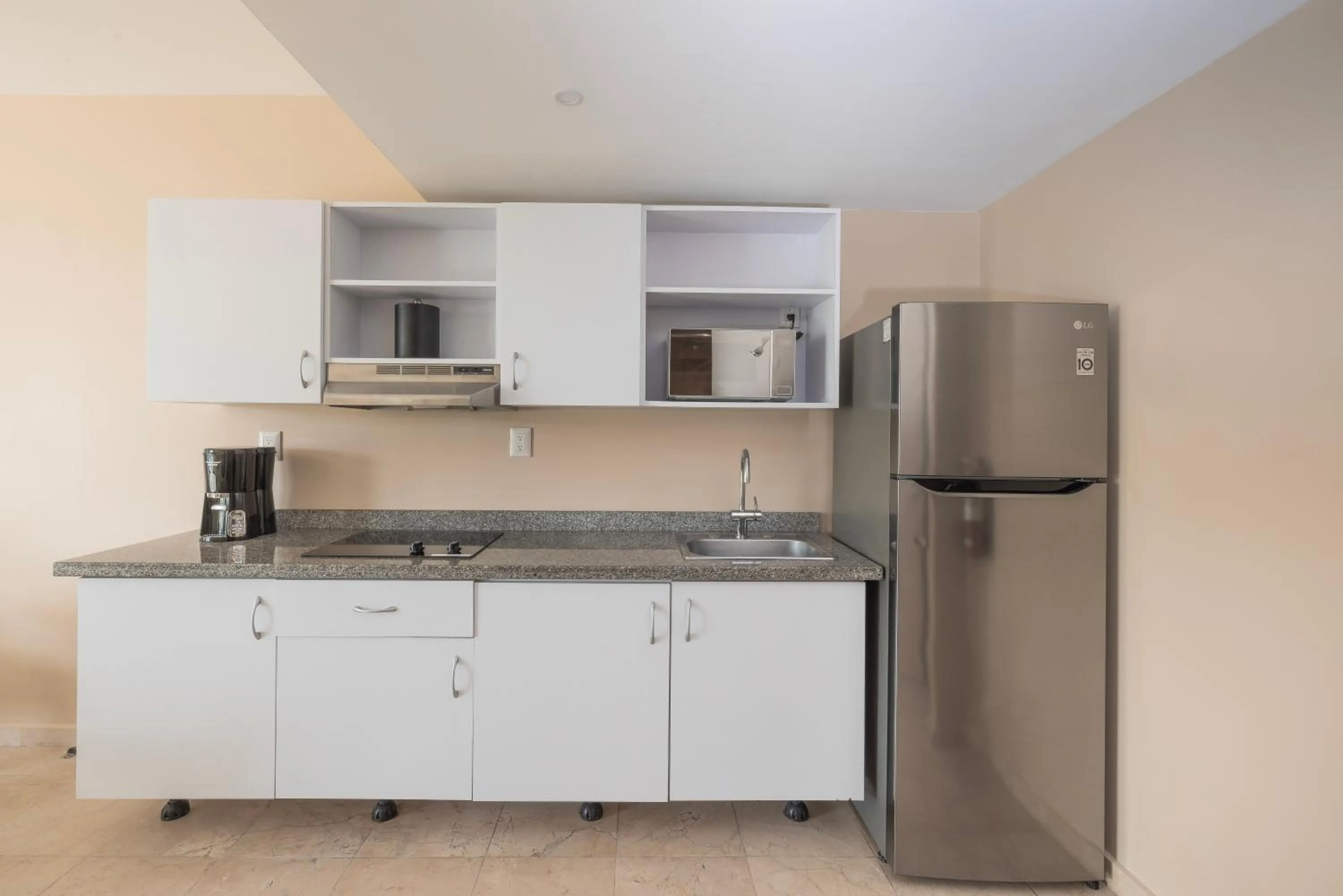 kitchen in The Mill Resort and Suites