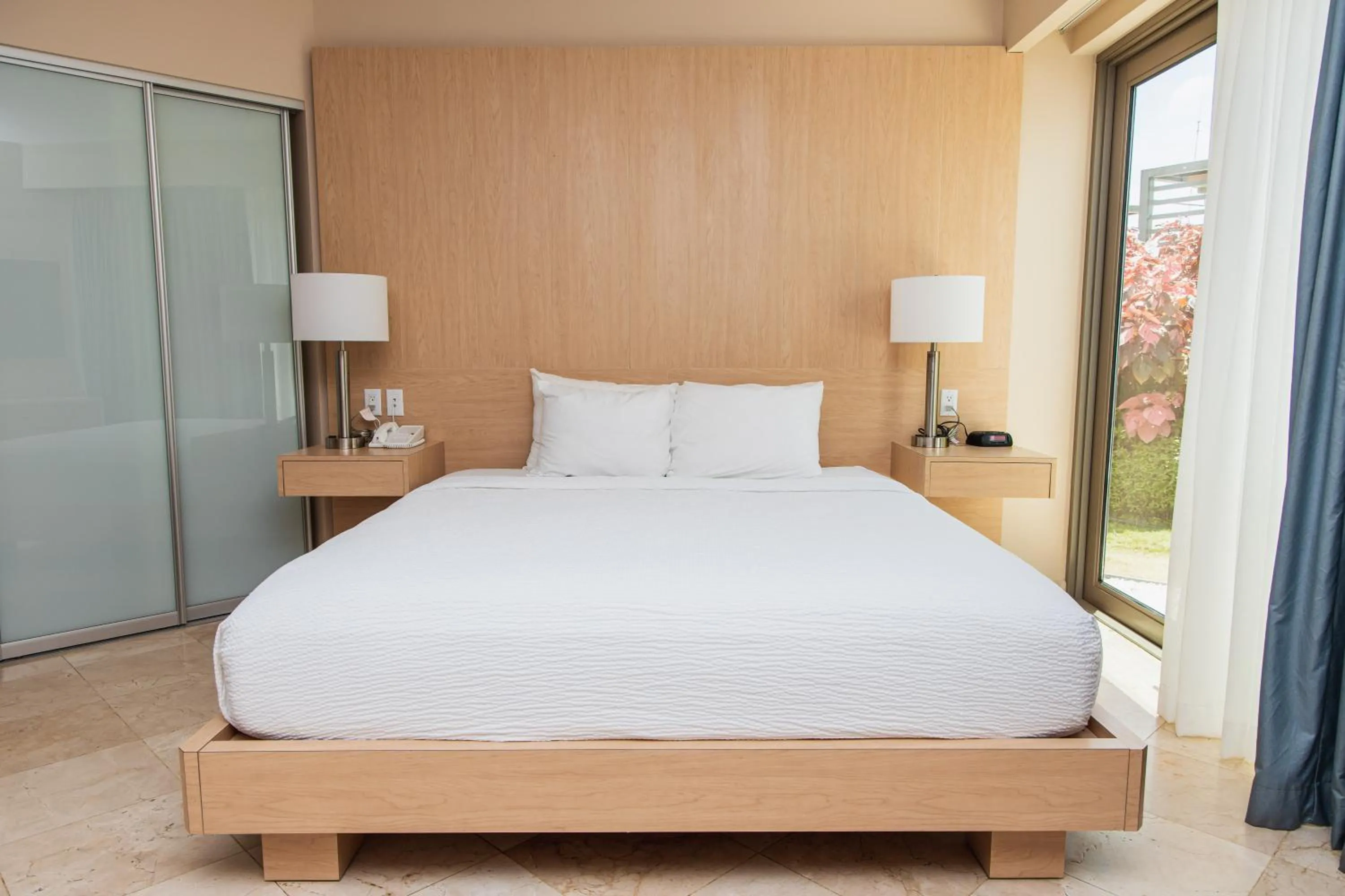 Bed in The Mill Resort and Suites