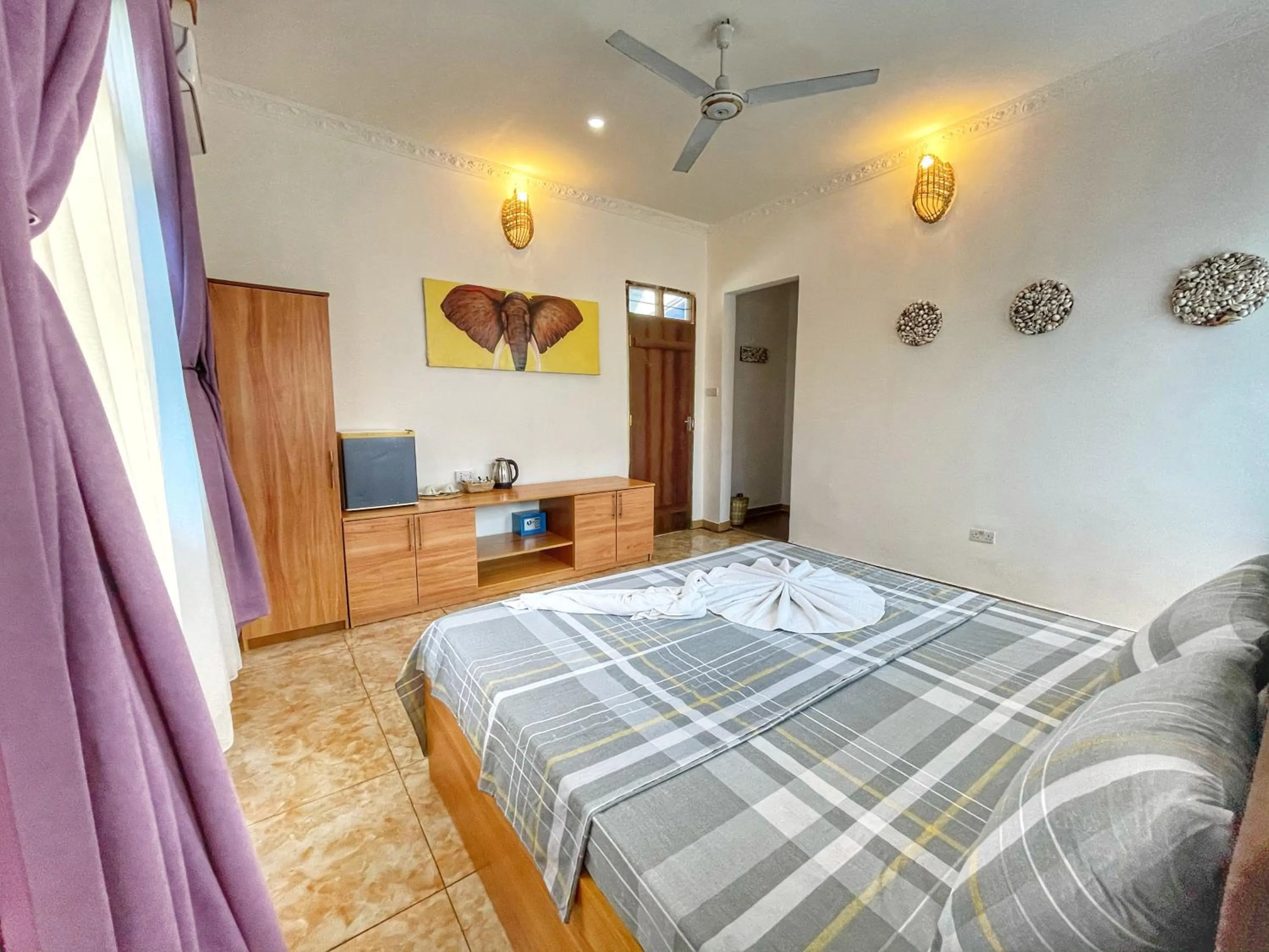 Bed in Max Hotel Nungwi