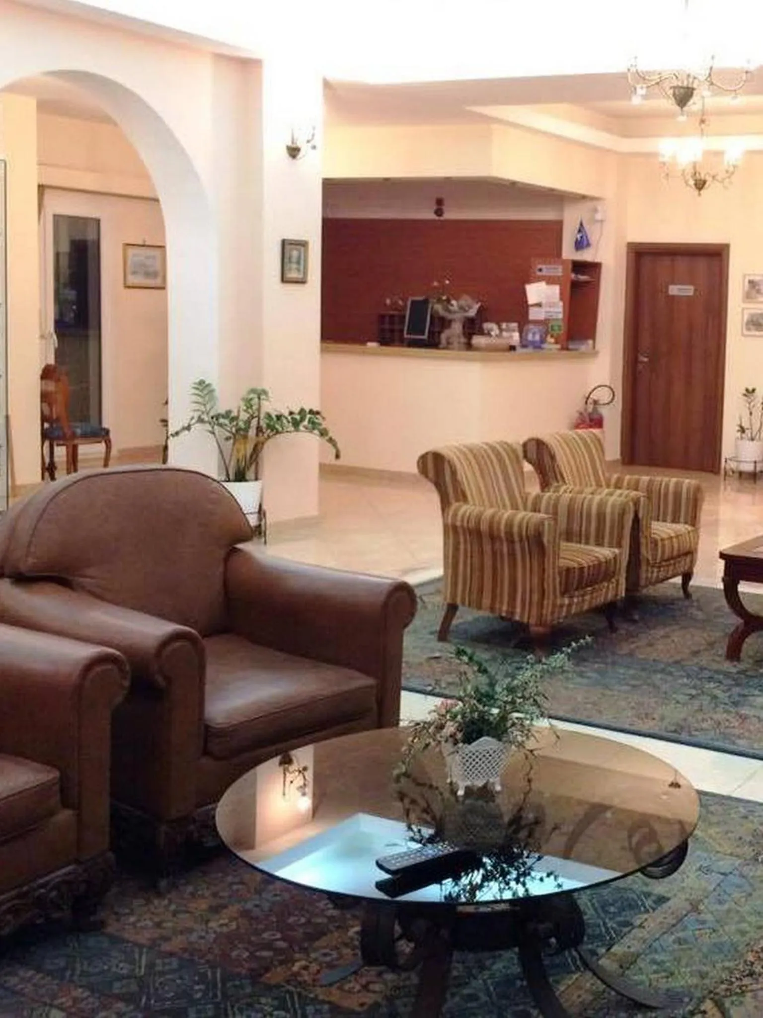 Communal lounge/ TV room in Nefeli Boutique Hotel