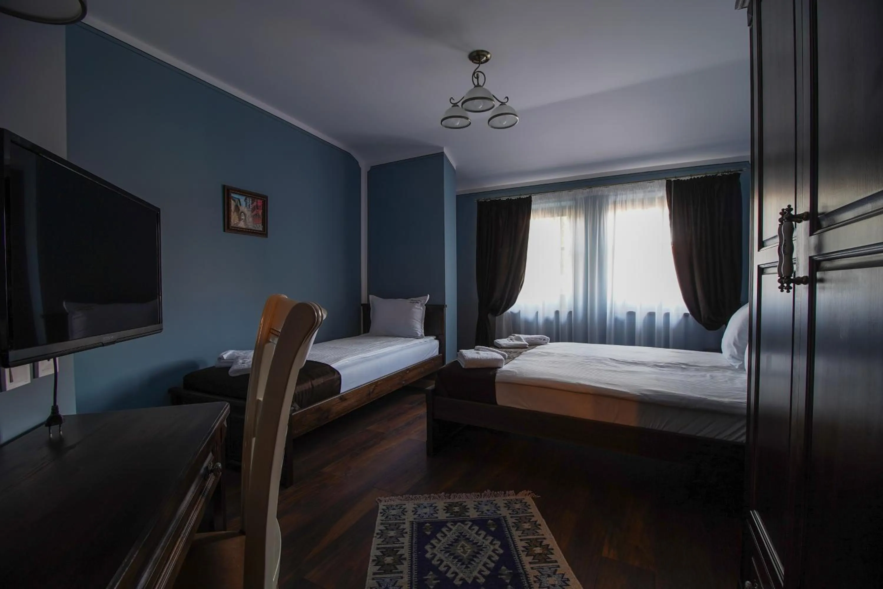 Bed in Pulpudeva Family Hotel