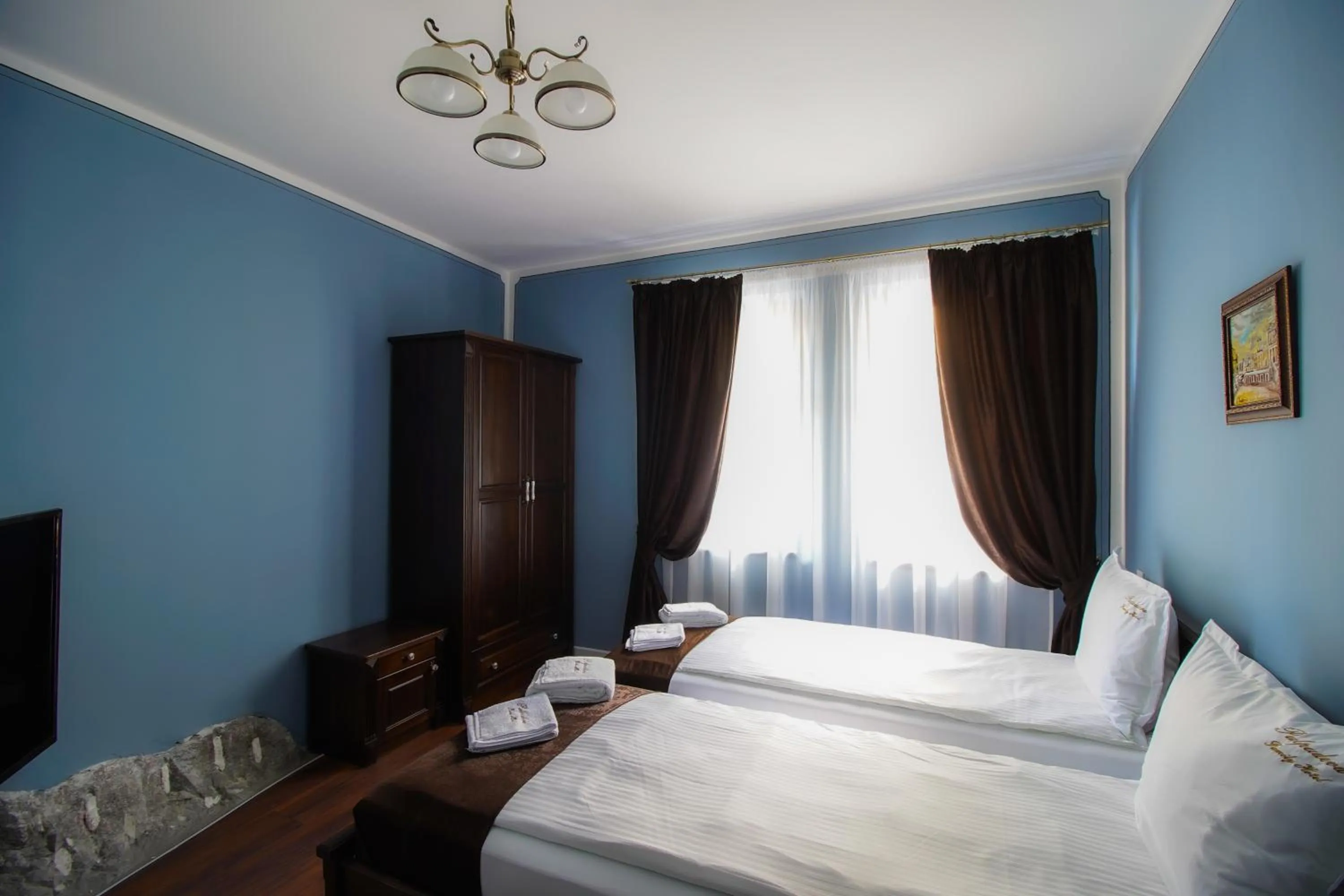 Bed in Pulpudeva Family Hotel