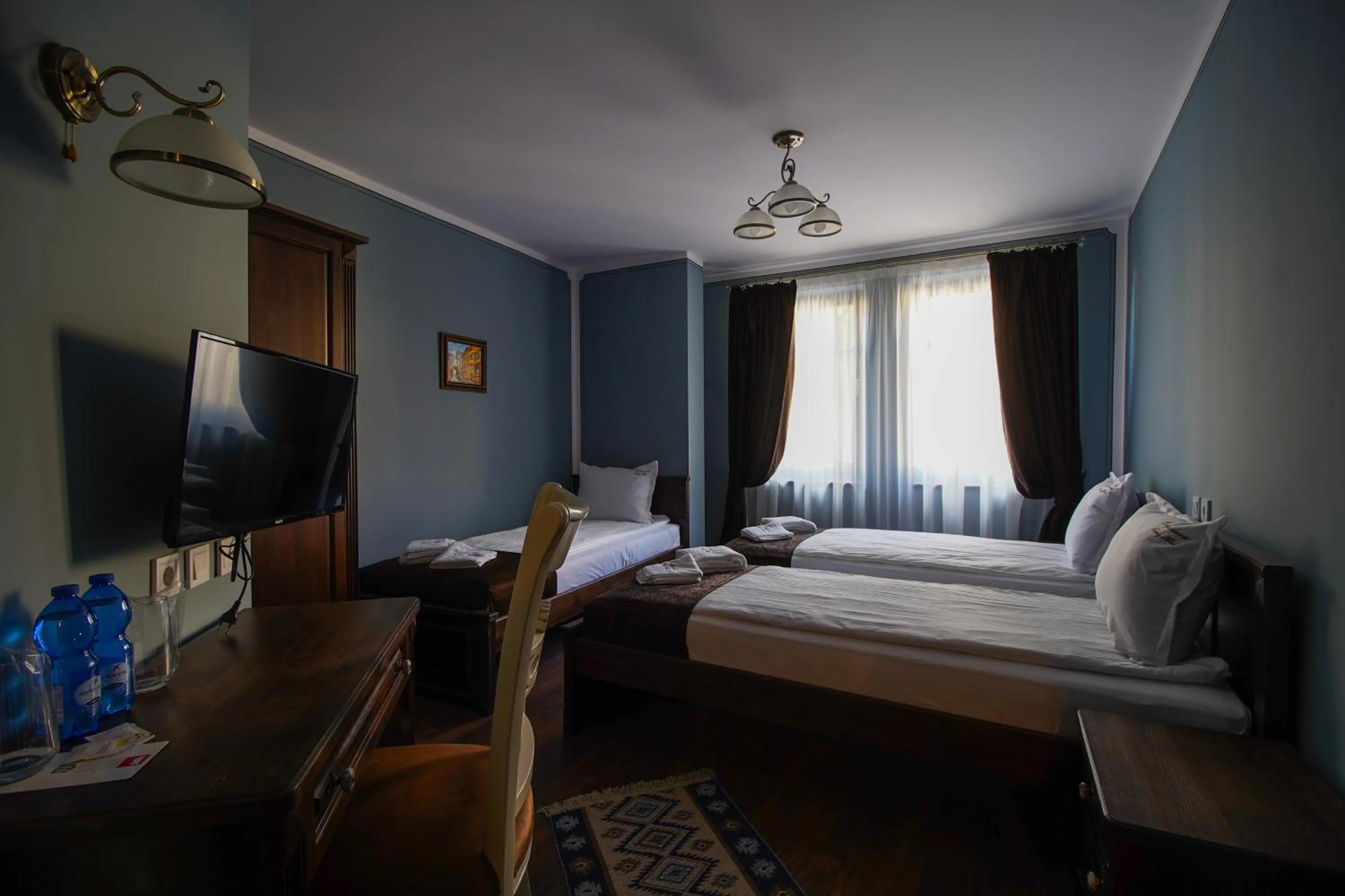 Bed in Pulpudeva Family Hotel