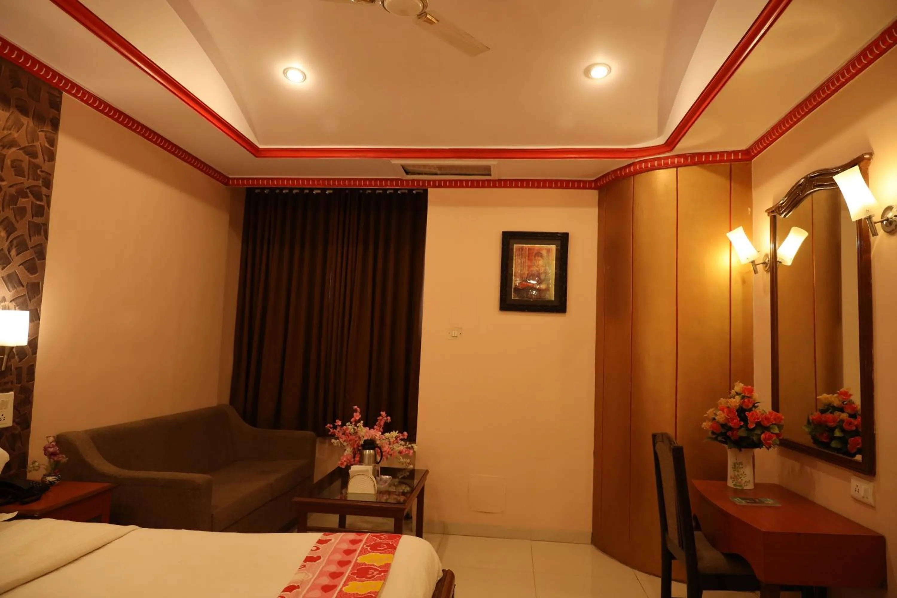 Seating area, Bed in Hotel Pratap Heritage