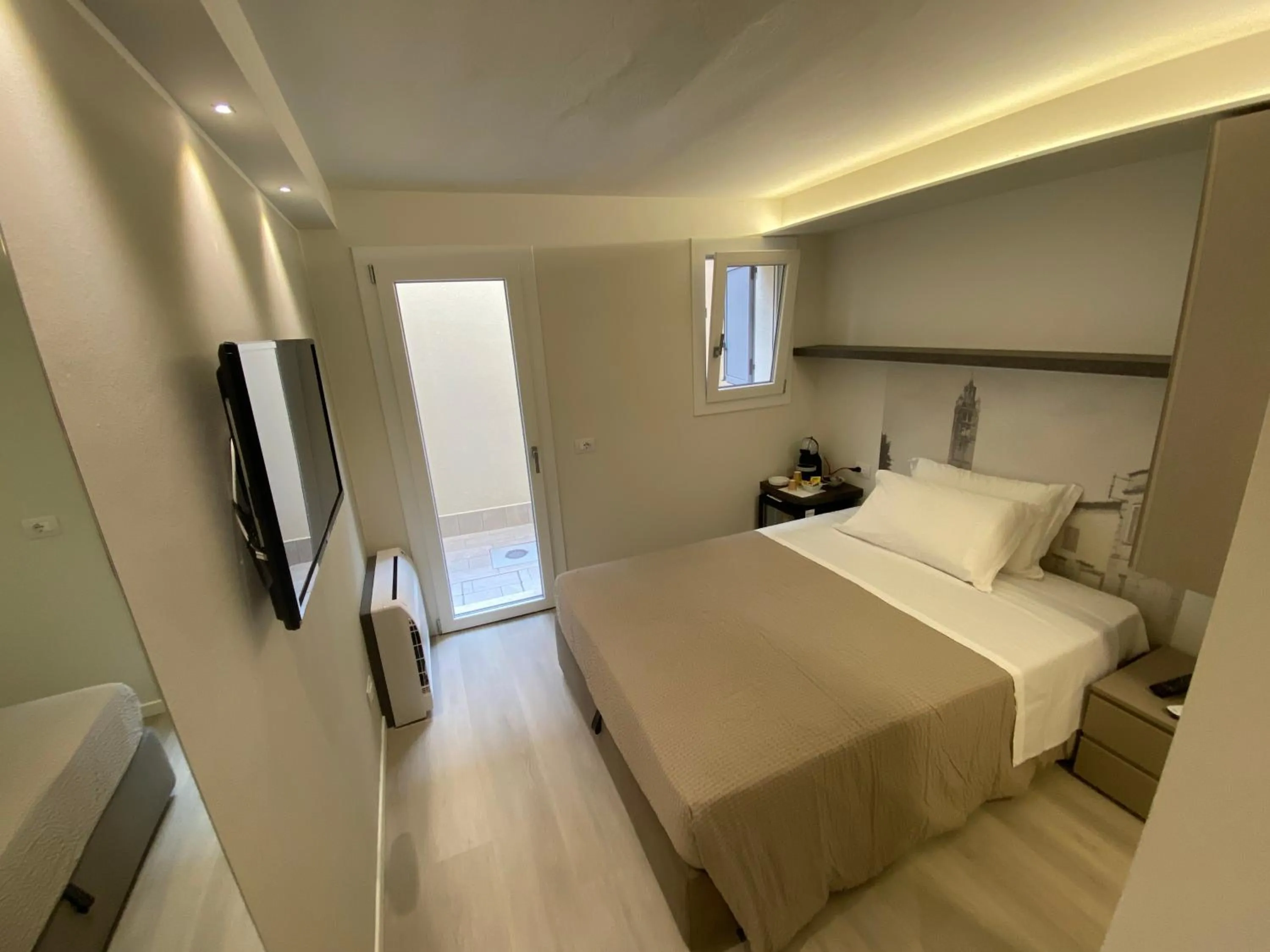 Patio, Bed in Affittacamere Ventisettembre