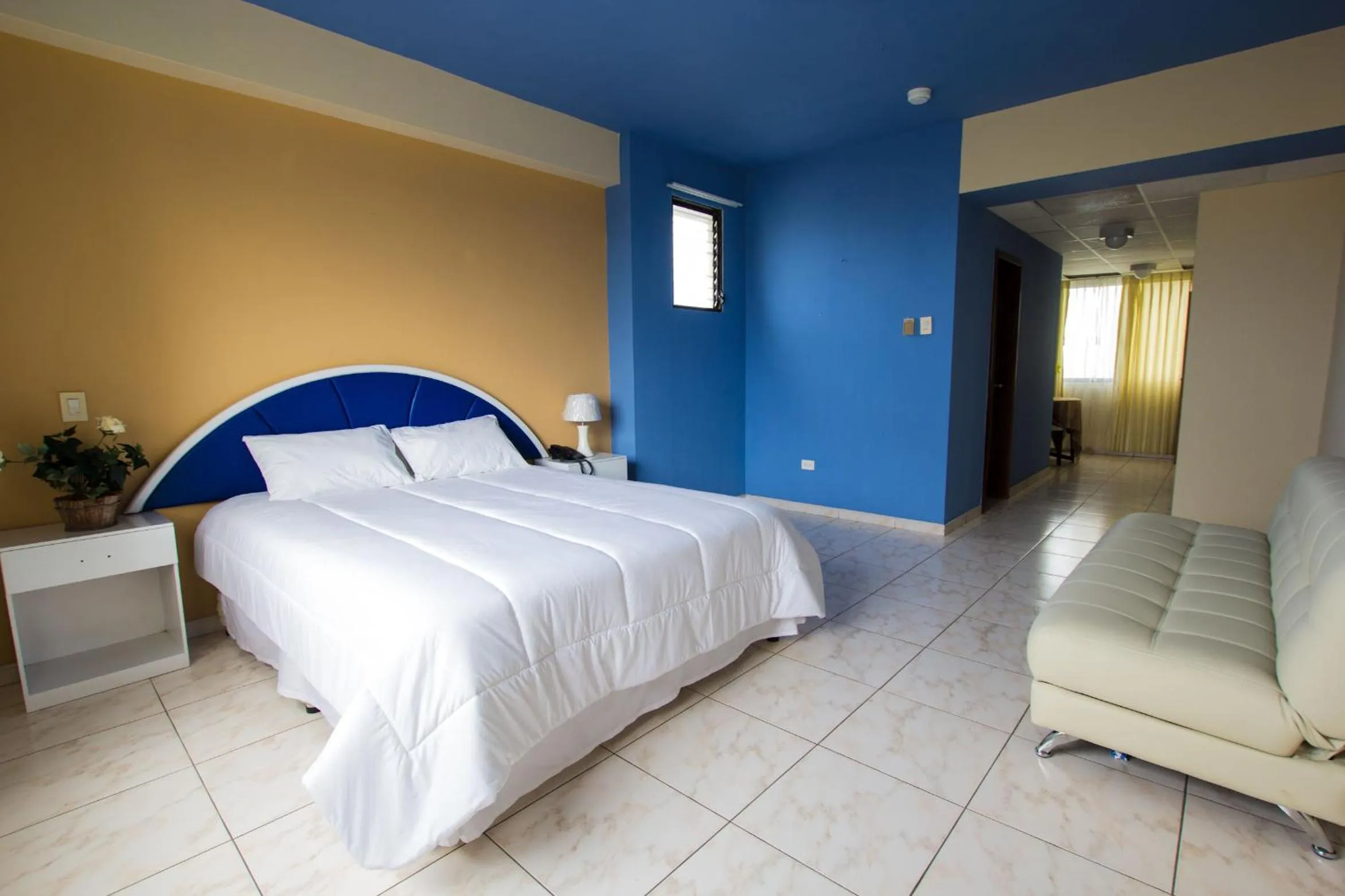 Bed in Blue Bay Hotel