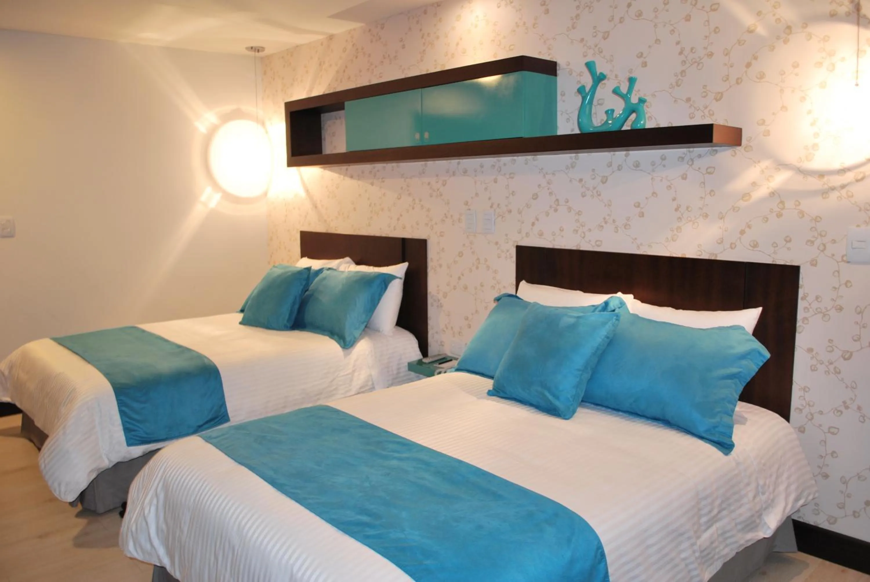 Bed in Rioné Hotel Boutique