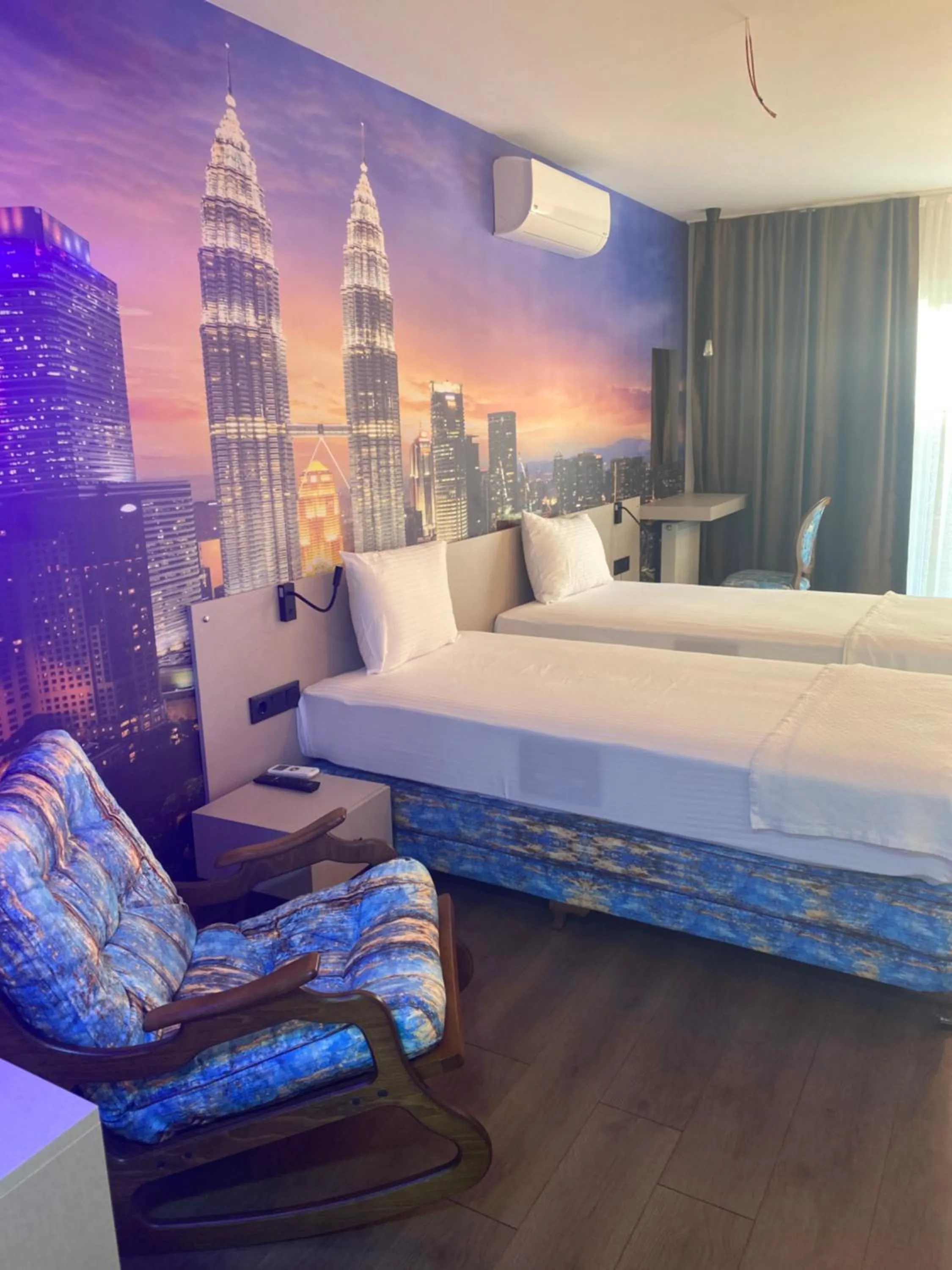 Bed in OFURO WORLD HOTEL SPA