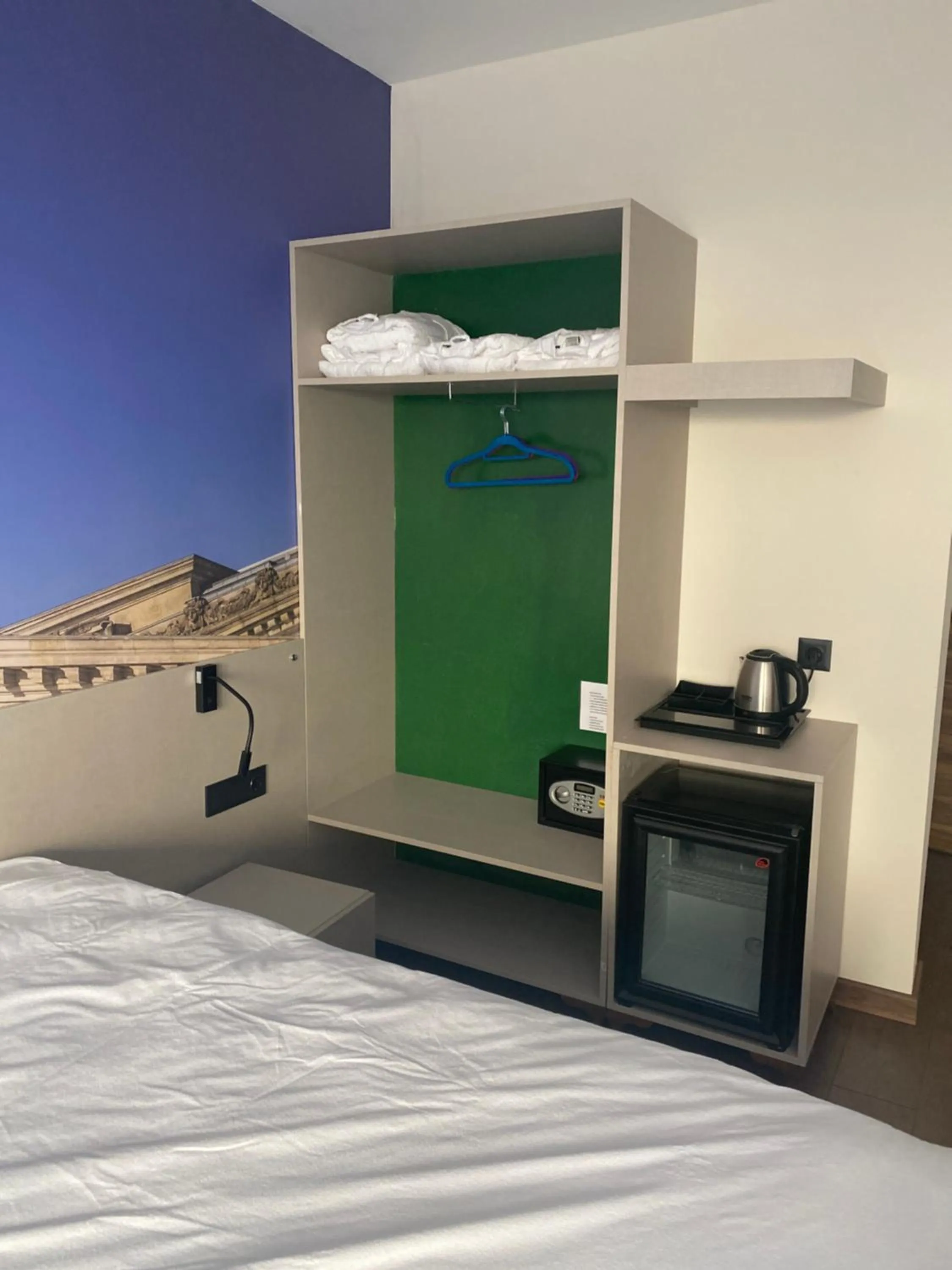 Bed in OFURO WORLD HOTEL SPA