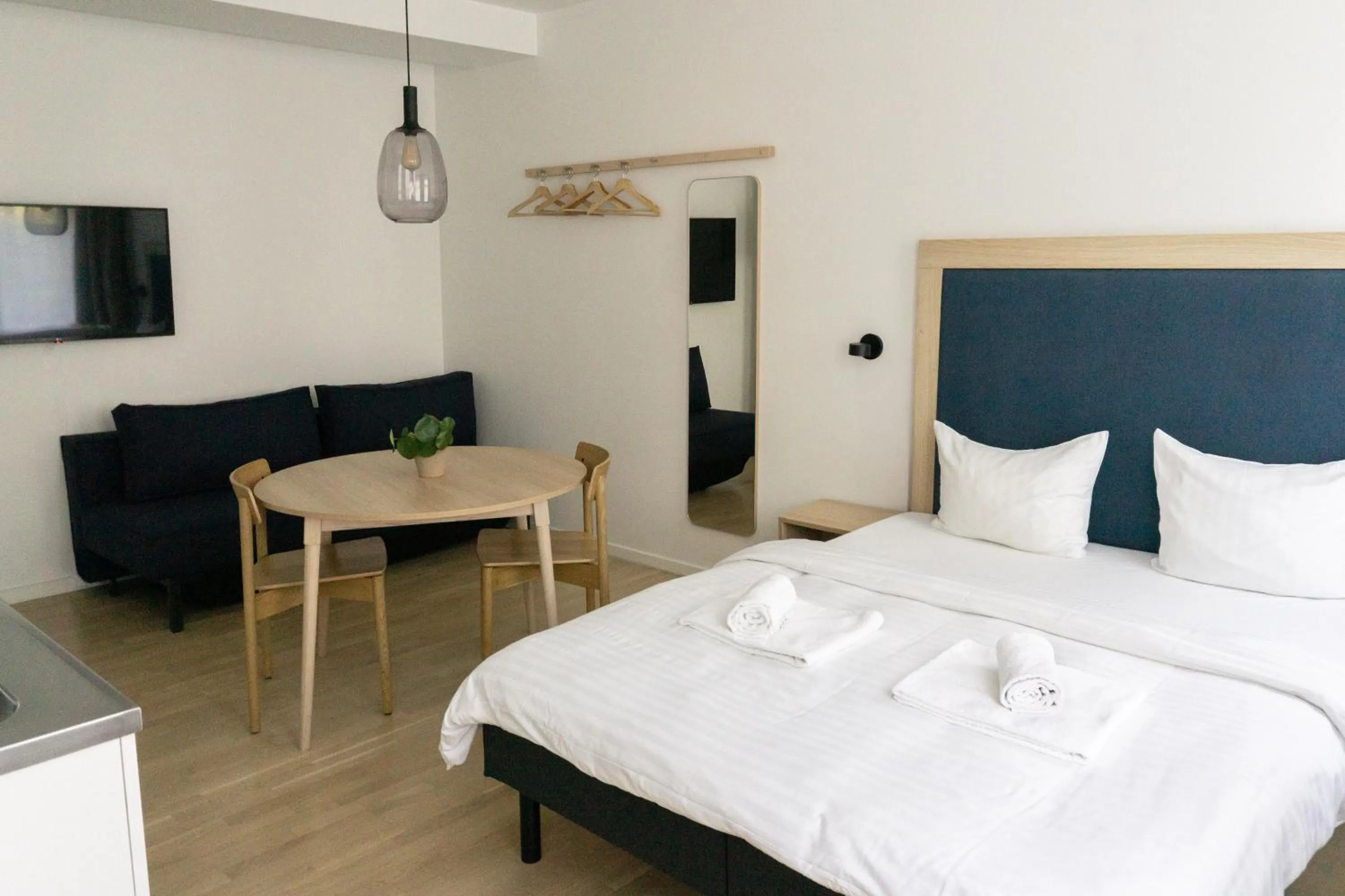 Bed in STUDIO1A Hotel Apartments