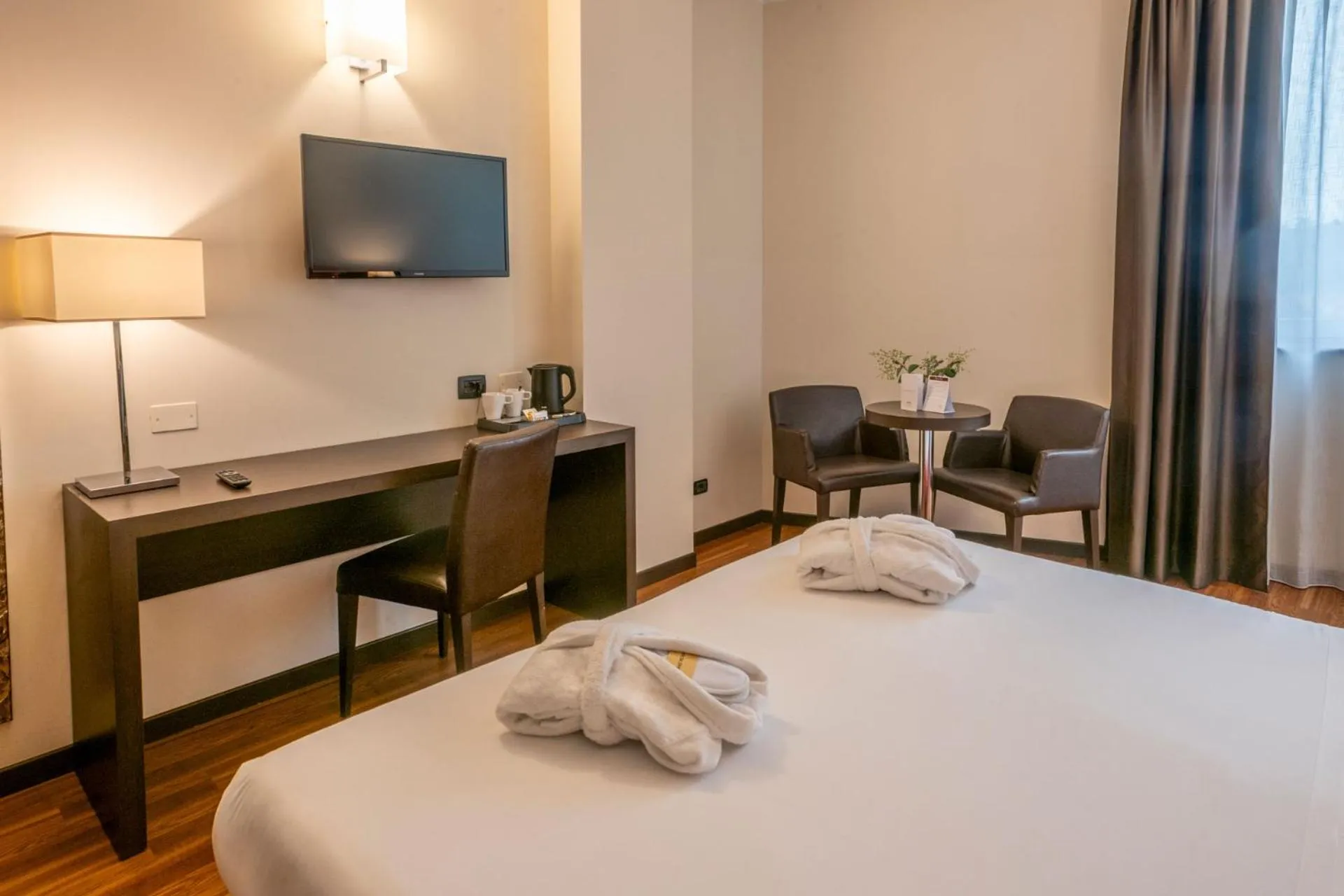 Bed in Kona Hotel Verona by Kleos Group Collection