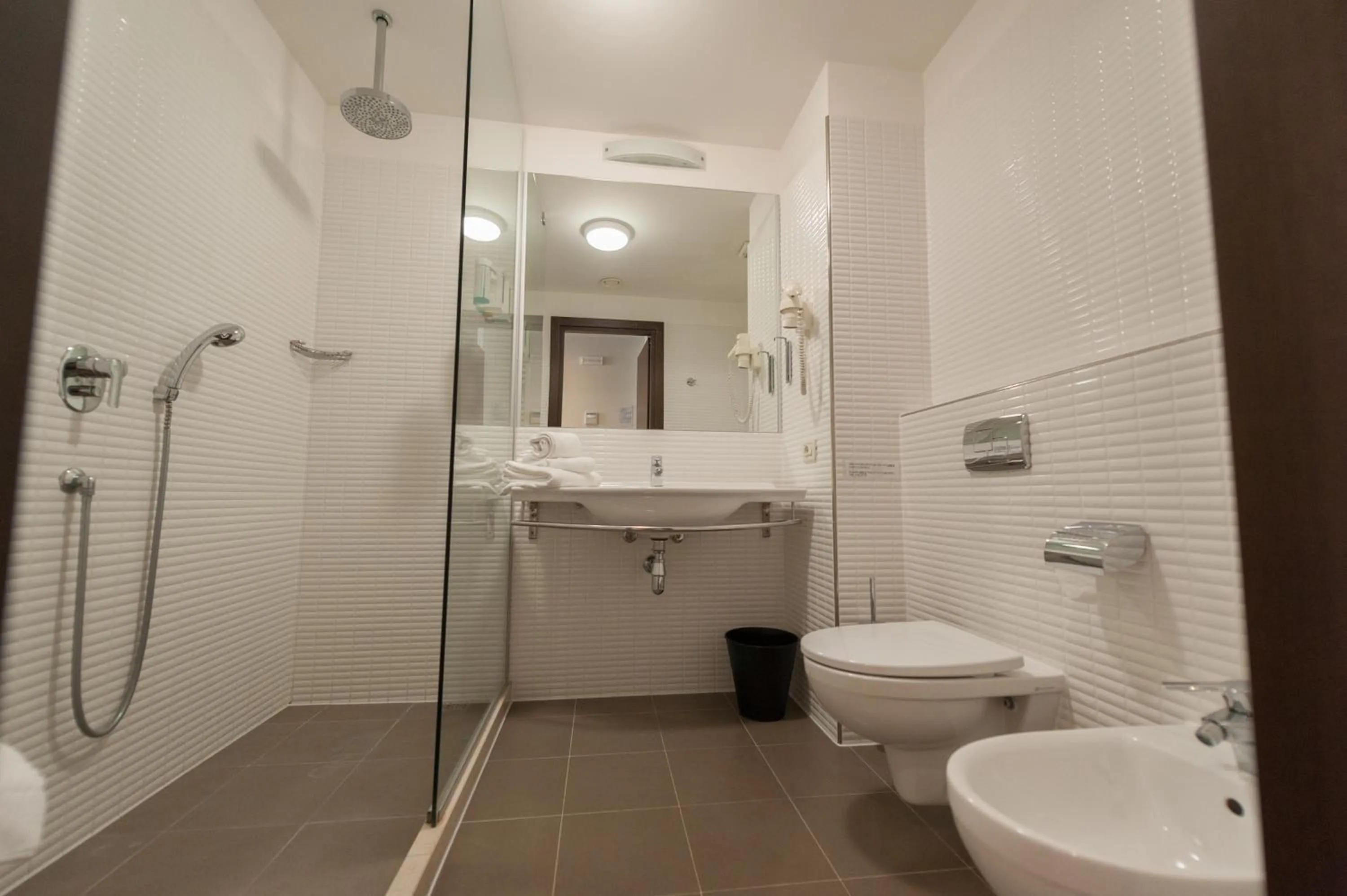 Shower in Kona Hotel Verona by Kleos Group Collection