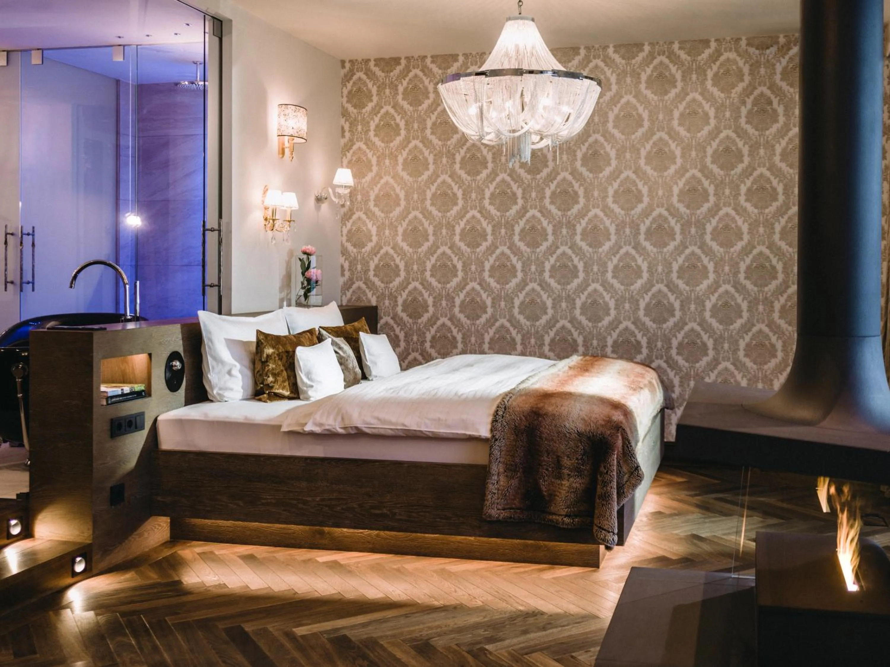 Living room, Bed in Das König Ludwig Inspiration SPA